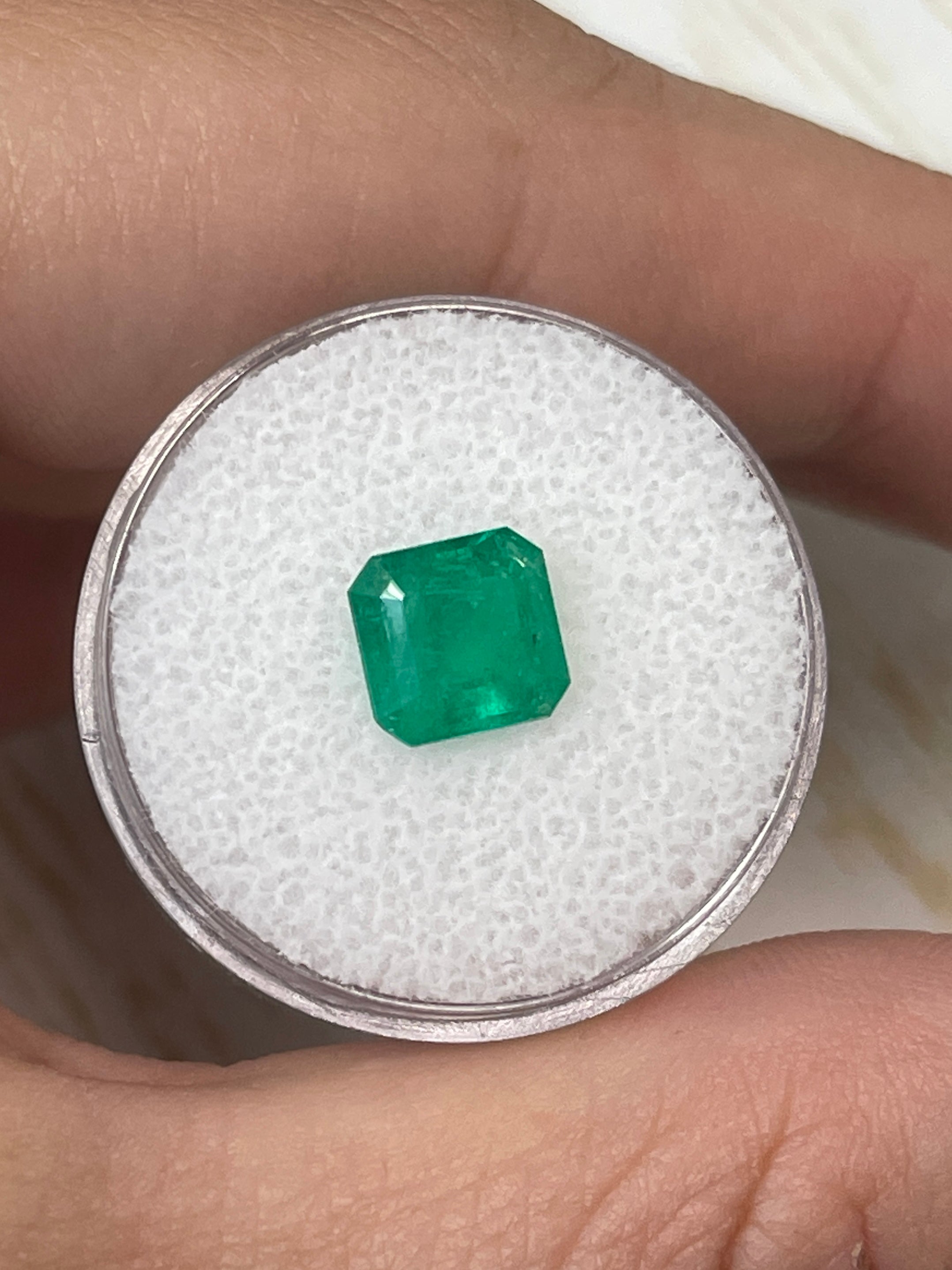 1.84 carat natural Colombian emerald loose Asscher cut gemstone from JR Colombian Emeralds, showcasing vibrant green color and clarity.