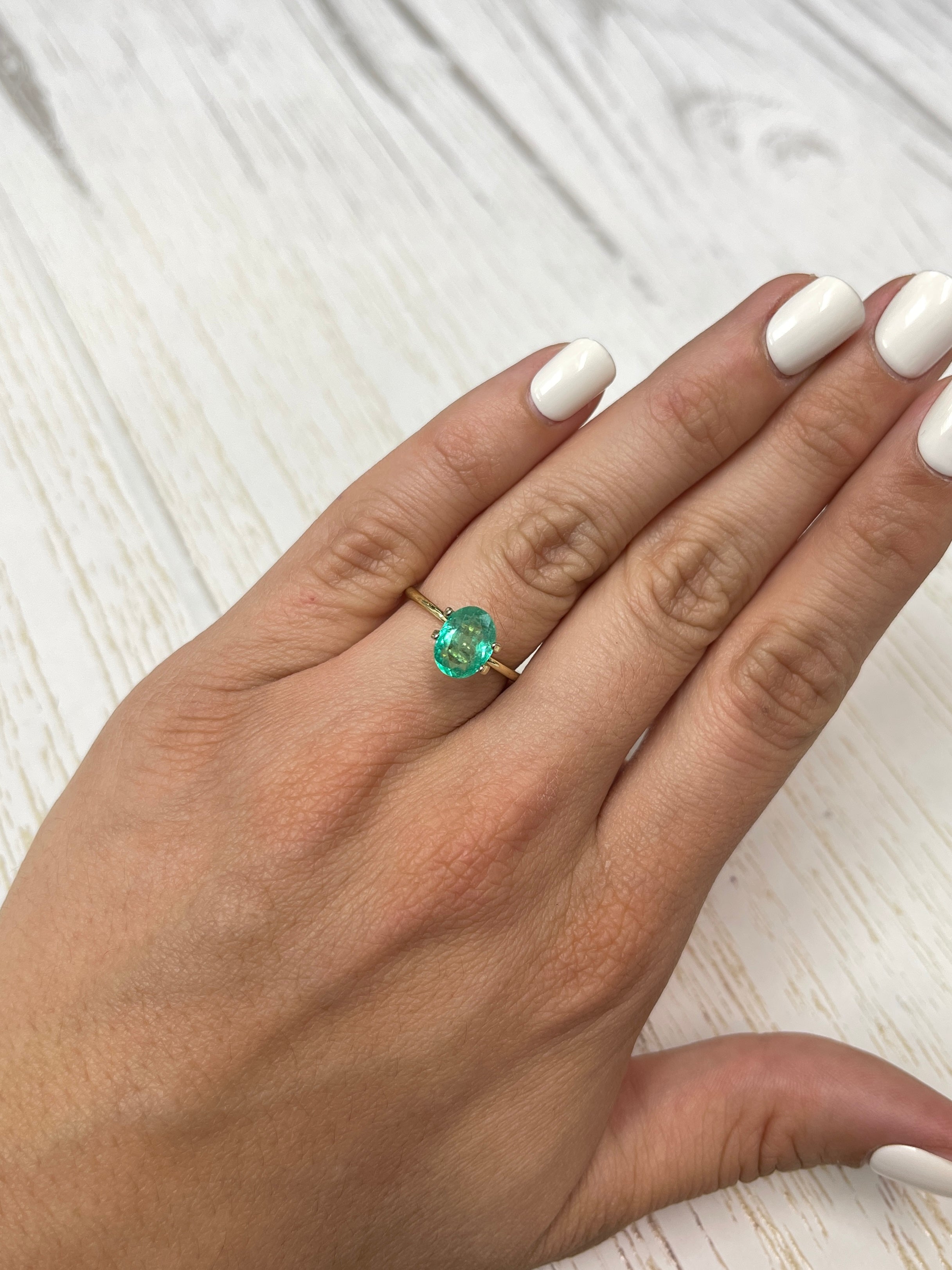 1.86 carat medium light green natural Colombian emerald loose oval cut gemstone from JR Colombian Emeralds.