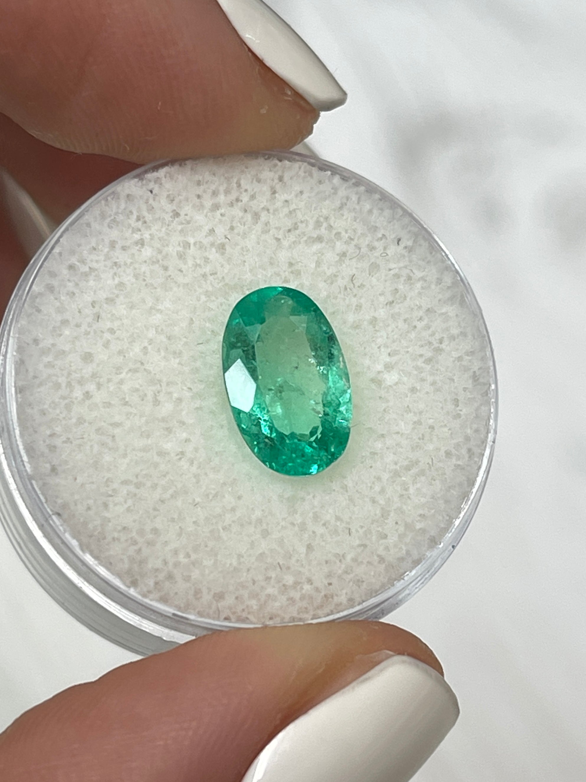 1.98 carat elongated oval green natural Colombian emerald loose gemstone from JR Colombian Emeralds.