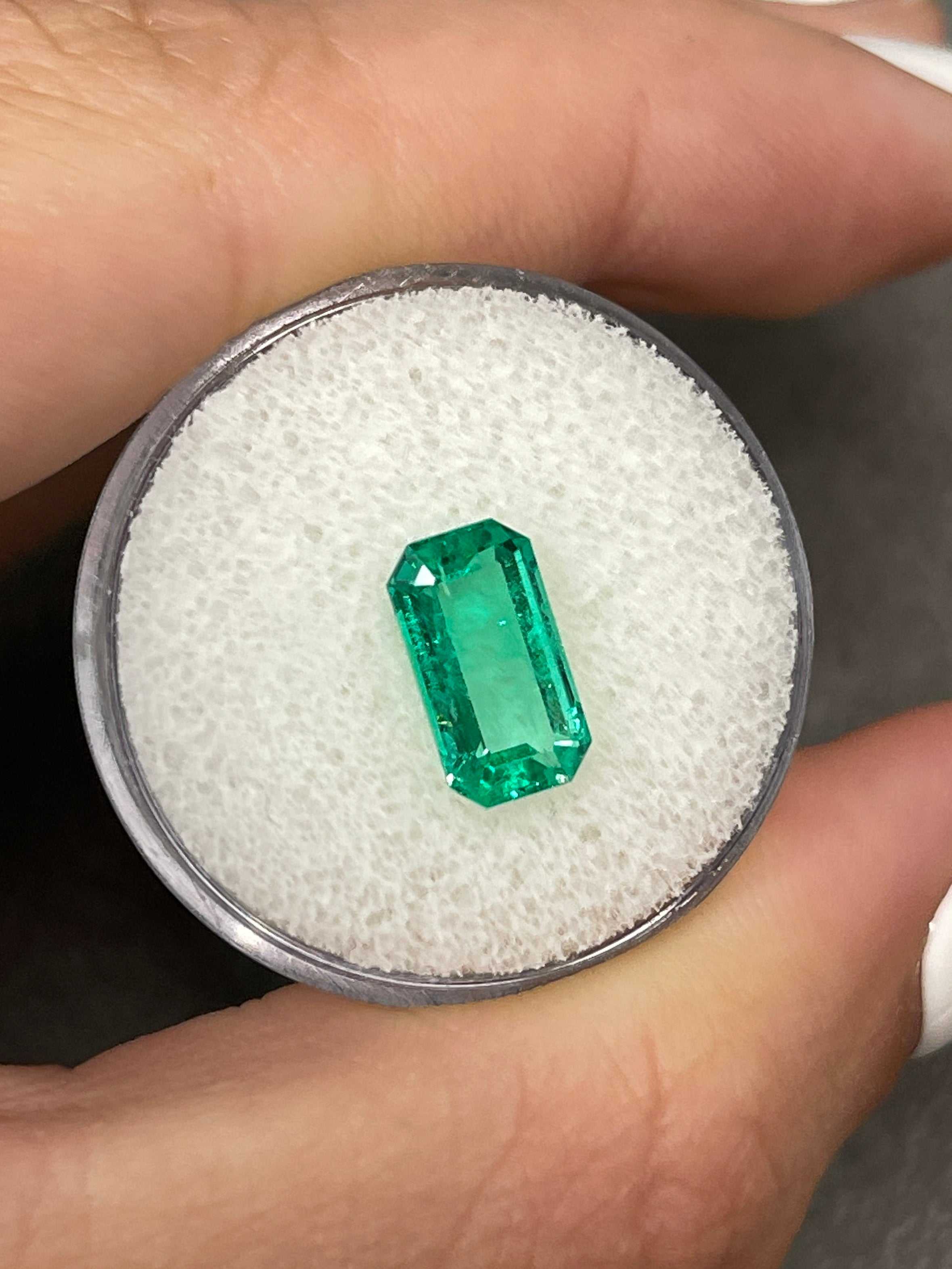 JR Colombian Emeralds 2.15 carat elongated emerald cut engagement ring with clipped corners, luminous 11x6 gemstone setting.