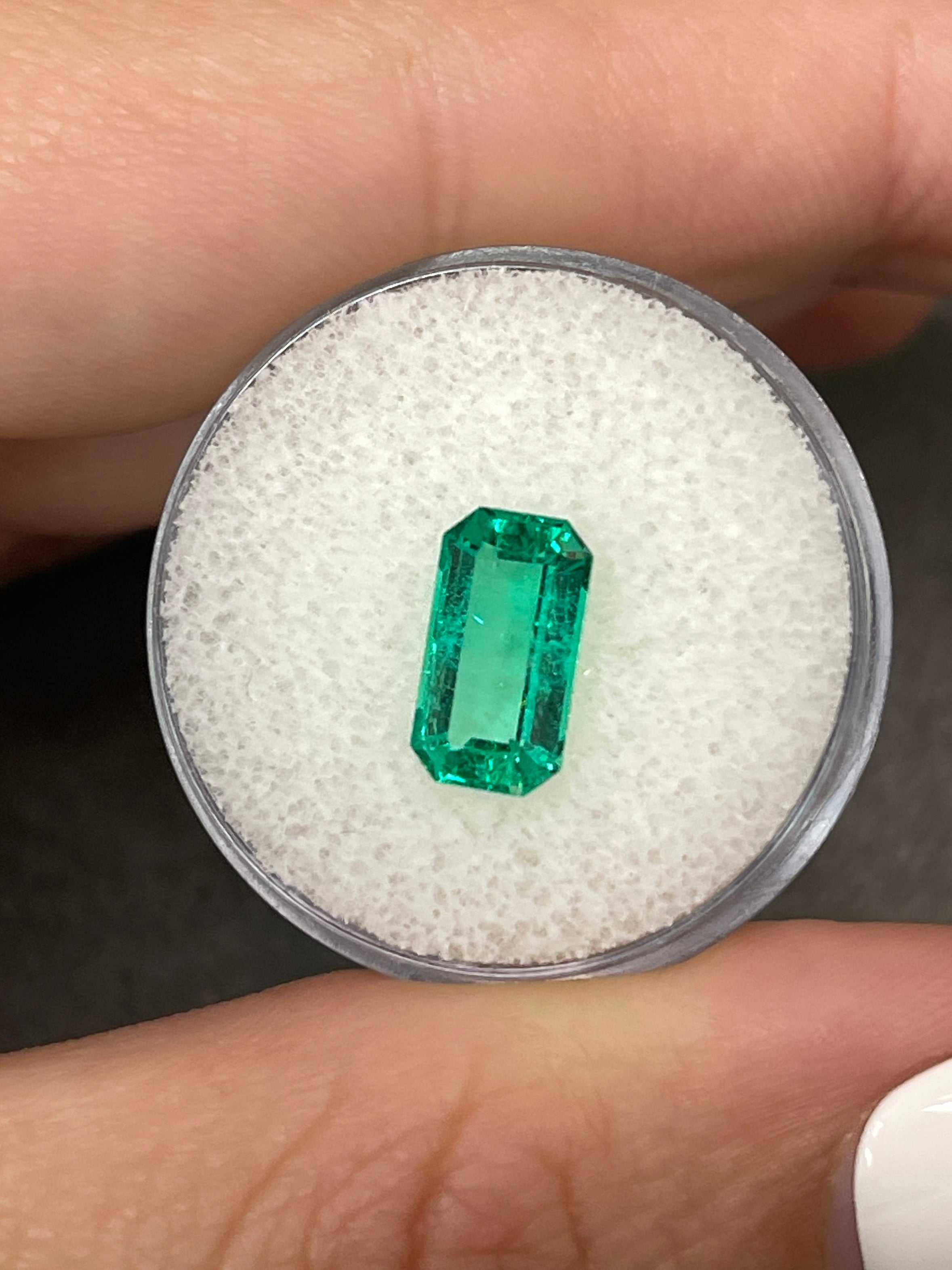 JR Colombian Emeralds 2.15 carat elongated emerald cut engagement ring with clipped corners and luminous sparkle.