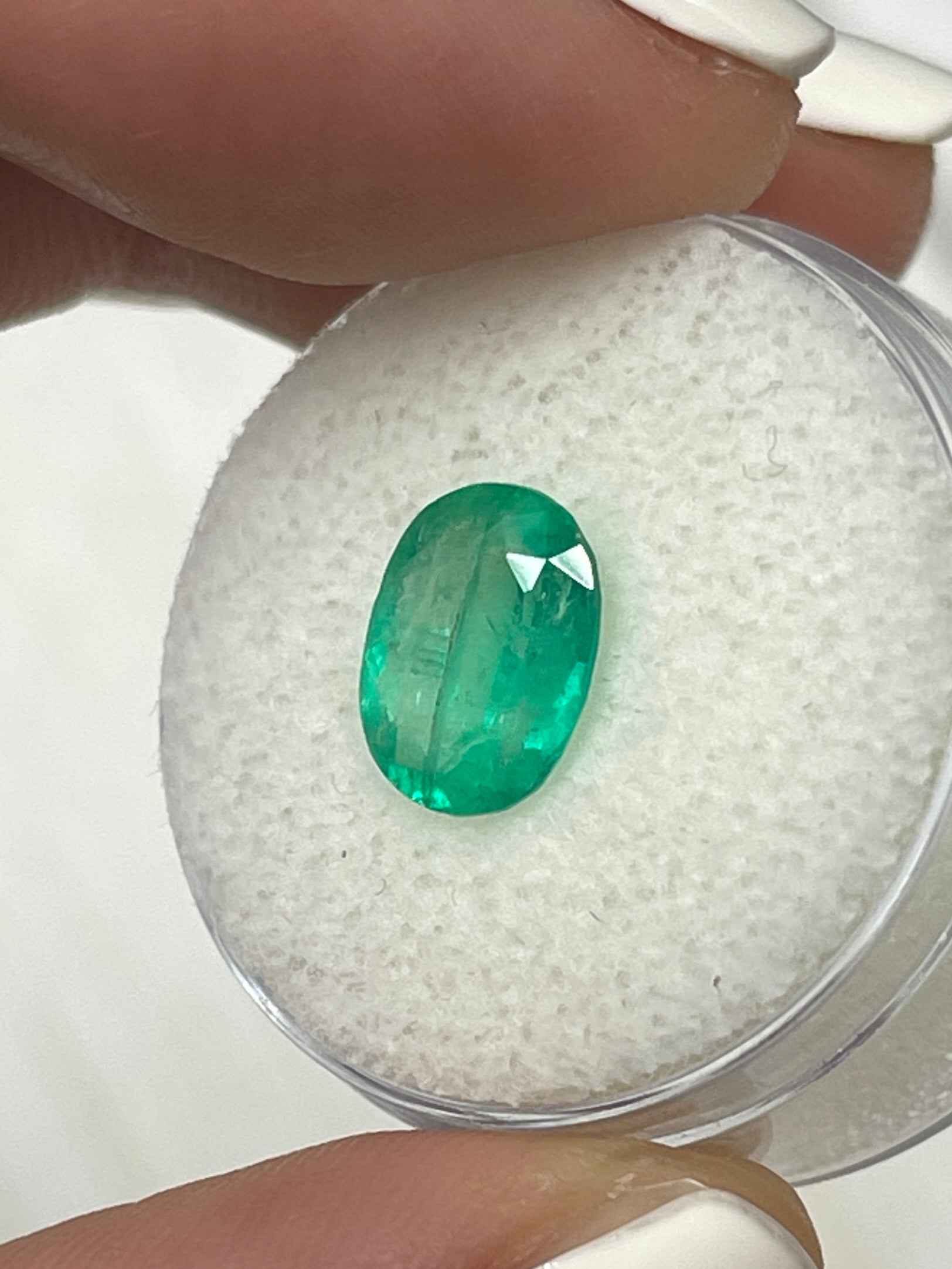2.19 carat green natural Colombian emerald in oval cut, loose gemstone from JR Colombian Emeralds.