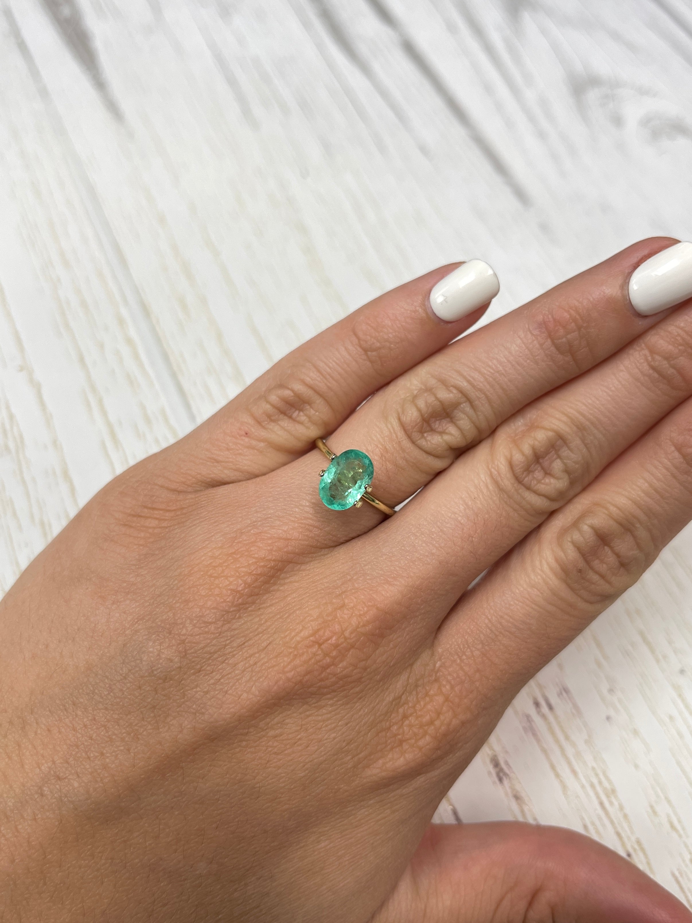 Light bluish green 2.22 carat natural Colombian emerald oval cut loose gemstone from JR Colombian Emeralds.
