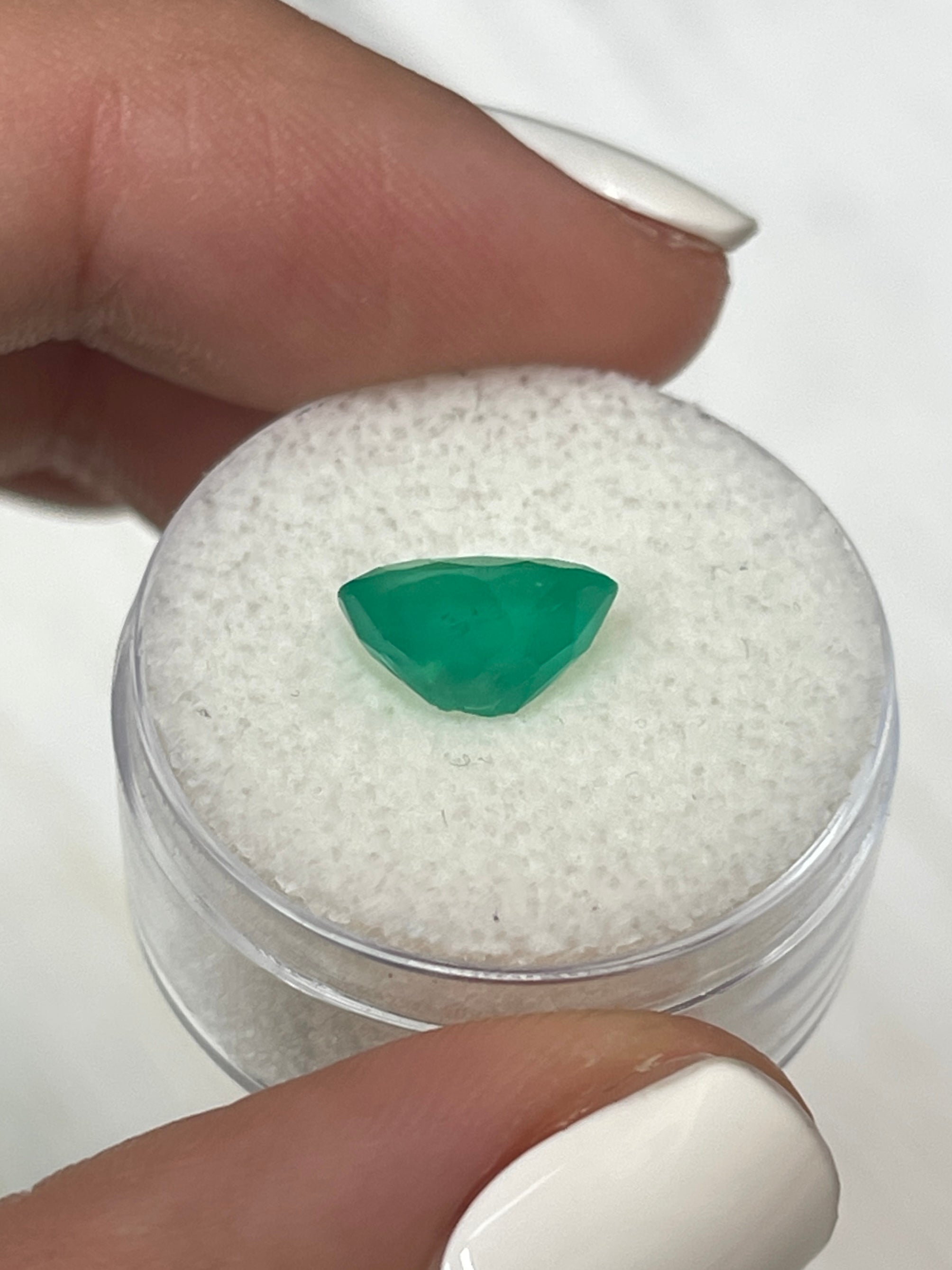 Oval cut 2.33 carat medium forest green natural Colombian emerald loose gemstone by JR Colombian Emeralds.