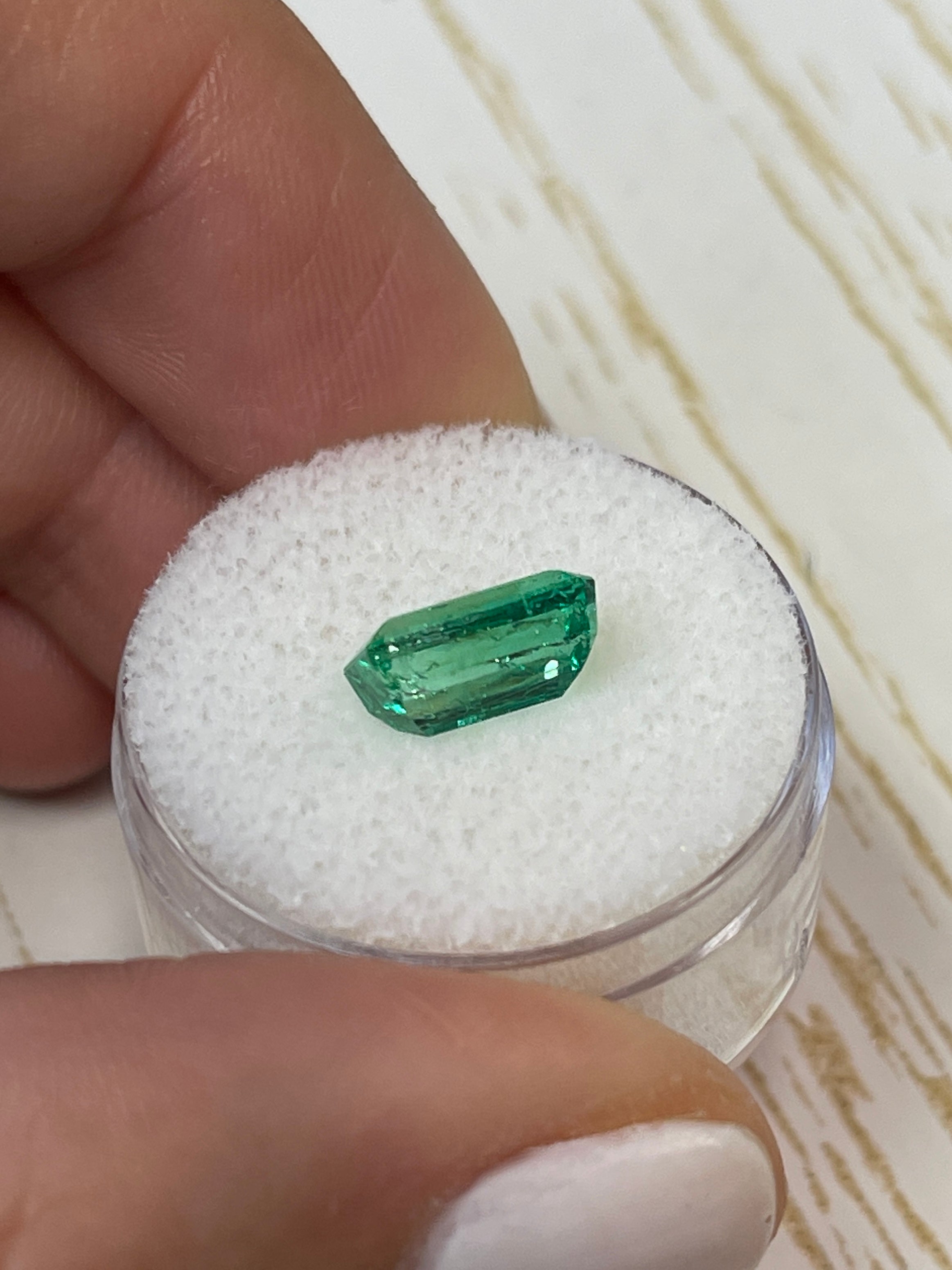 2.38-carat slender 10x6 mm Muzo green Colombian emerald loose gemstone in emerald cut, from JR Colombian Emeralds.
