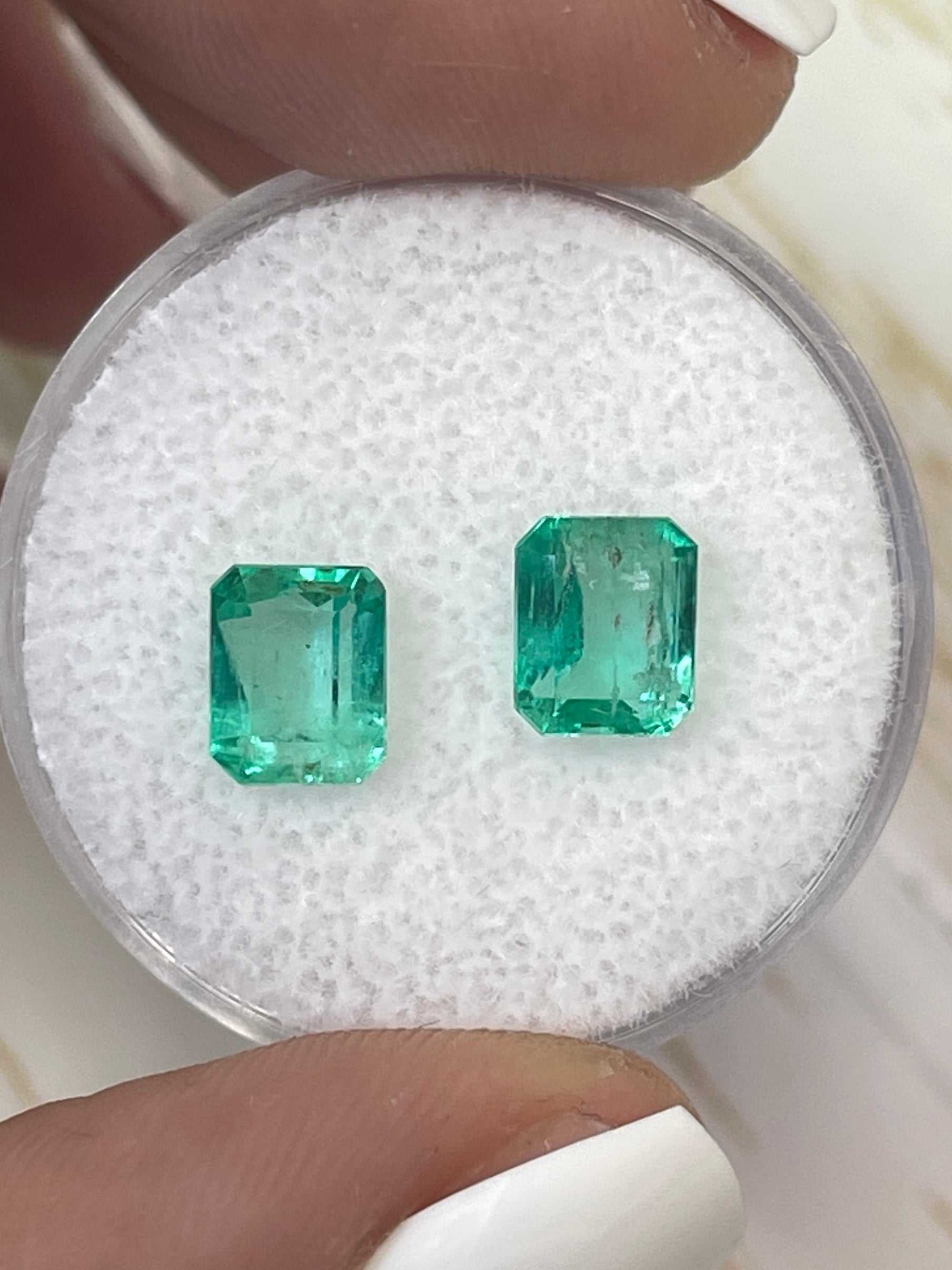 2.47 tcw emerald cut matching Colombian emeralds in private listing