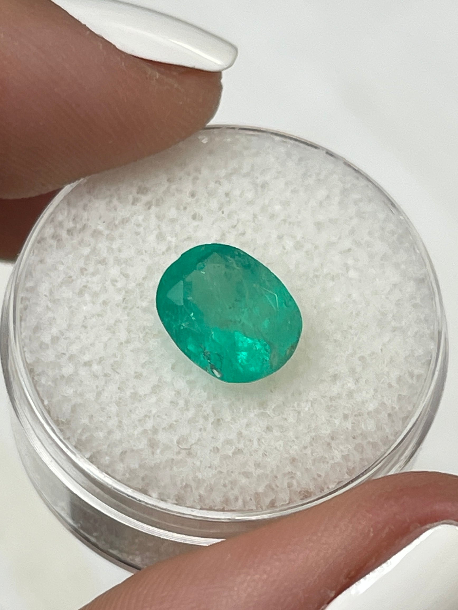 Medium green 2.48 carat Colombian emerald loose gemstone with oval cut, natural and vibrant, from JR Colombian Emeralds.