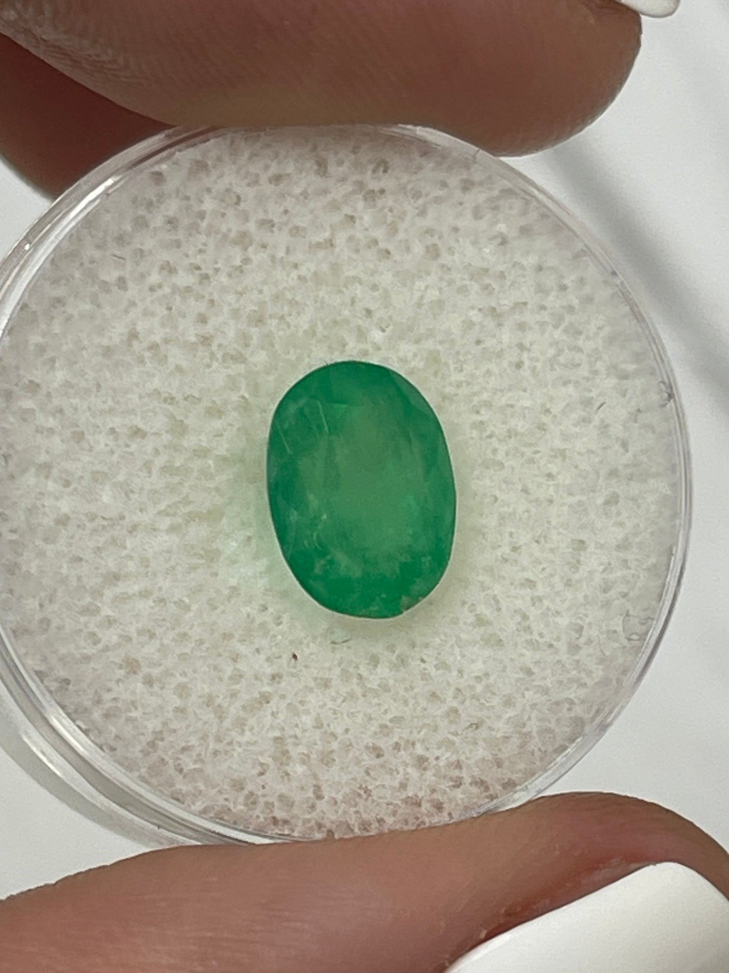 2.52 Carat mossy yellowish-green natural Colombian emerald in oval cut, loose gemstone from JR Colombian Emeralds.