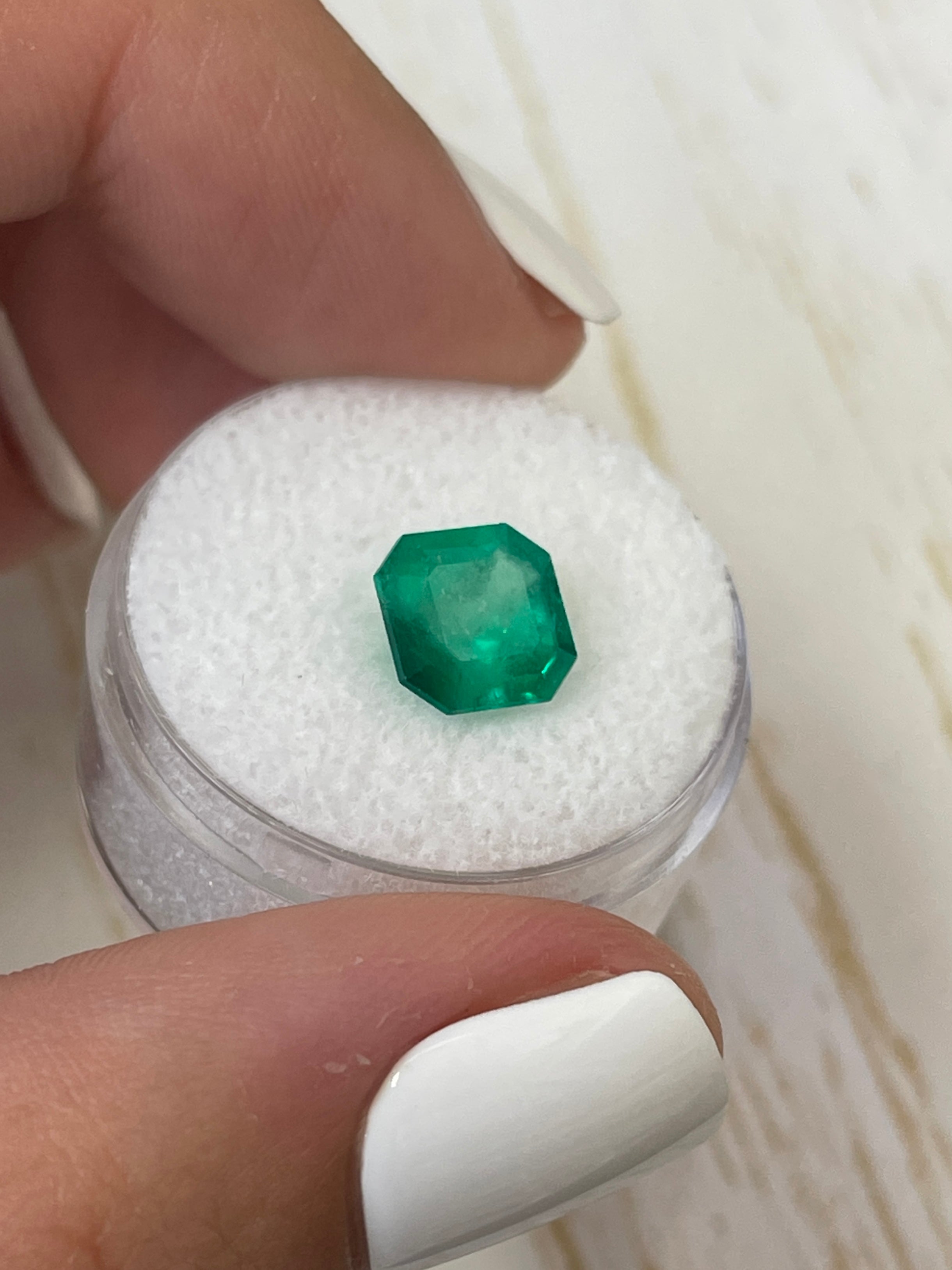 2.55 carat natural Colombian Muzo Green emerald loose Asscher cut from JR Colombian Emeralds. Bright green, transparent gemstone.