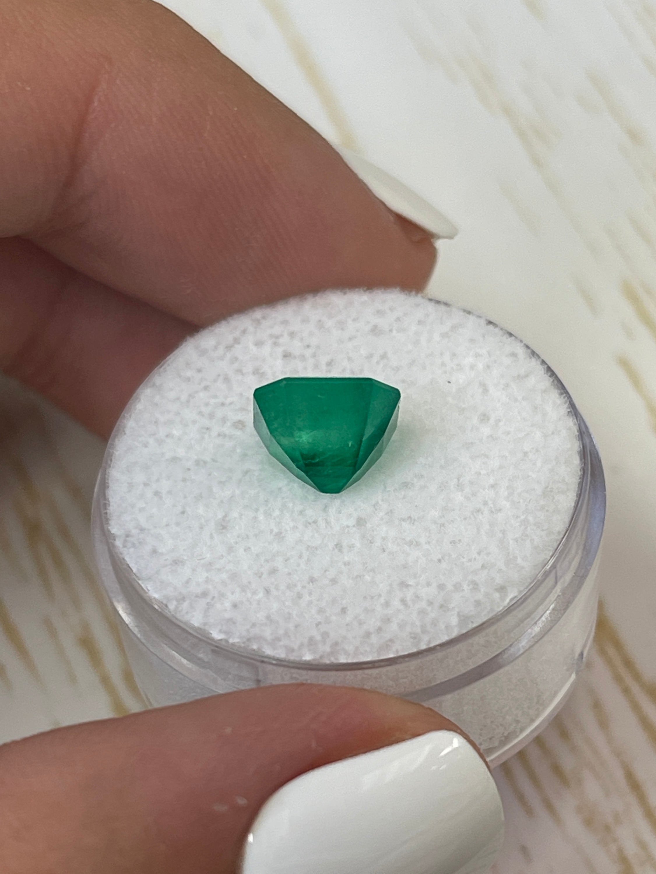 2.55 Carat Forest Muzo Green Colombian Emerald loose gemstone in Asscher cut, from JR Colombian Emeralds.