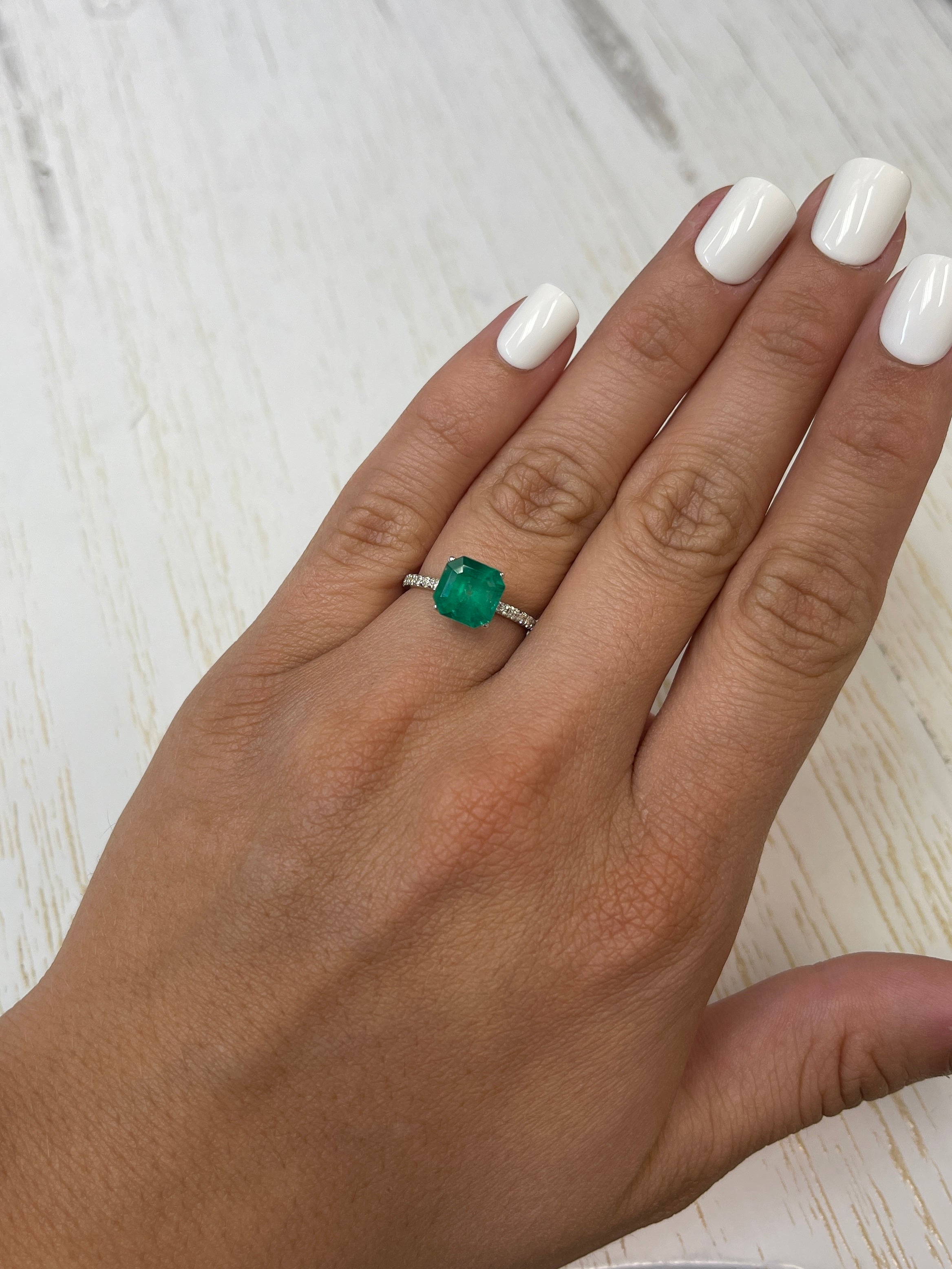 2.55 carat natural Colombian emerald loose gemstone, Asscher cut, vibrant forest Muzo green, from JR Colombian Emeralds.