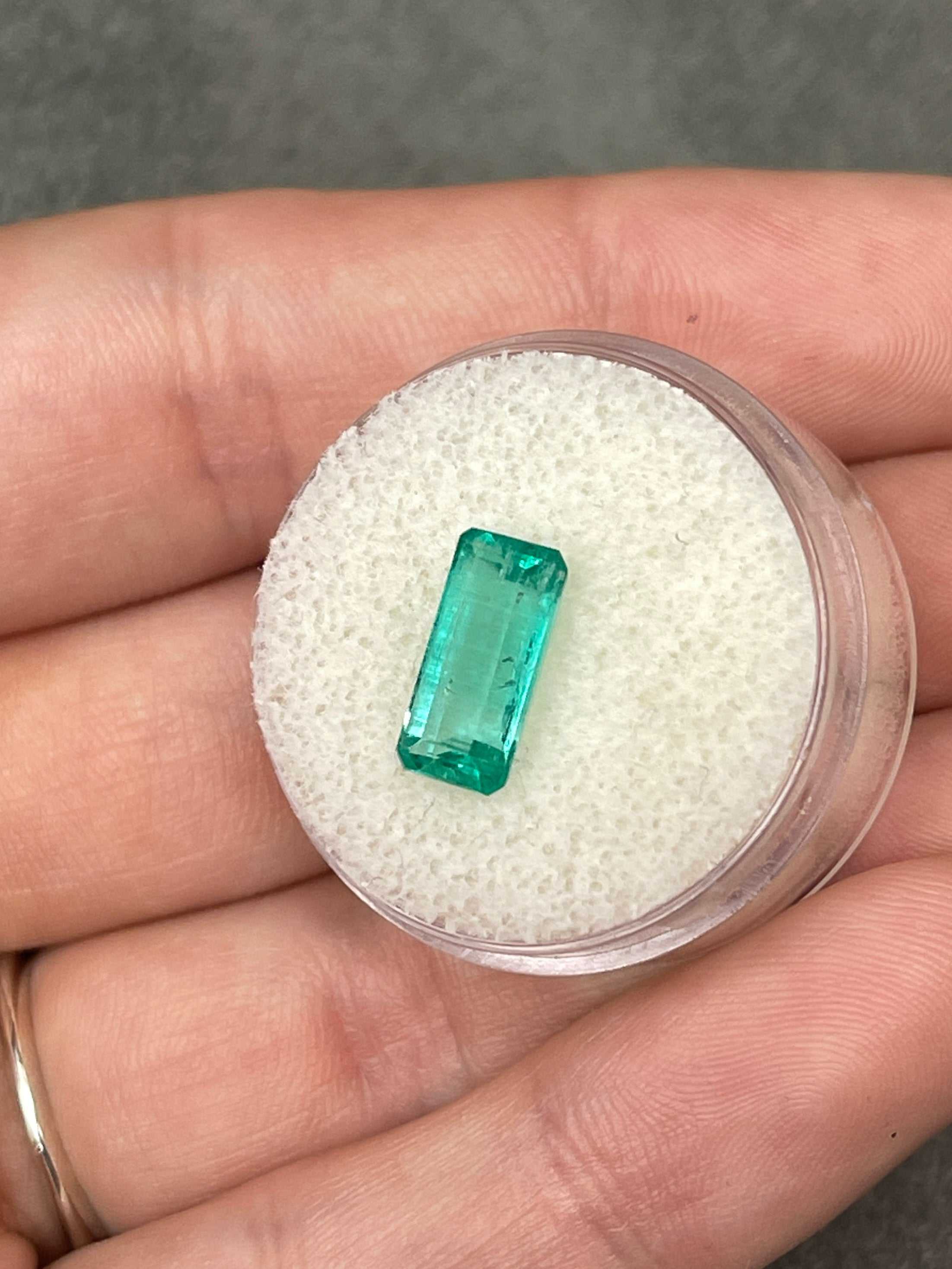 2.57 carat light bluish green natural Colombian emerald loose gemstone with elongated emerald cut, from JR Colombian Emeralds.