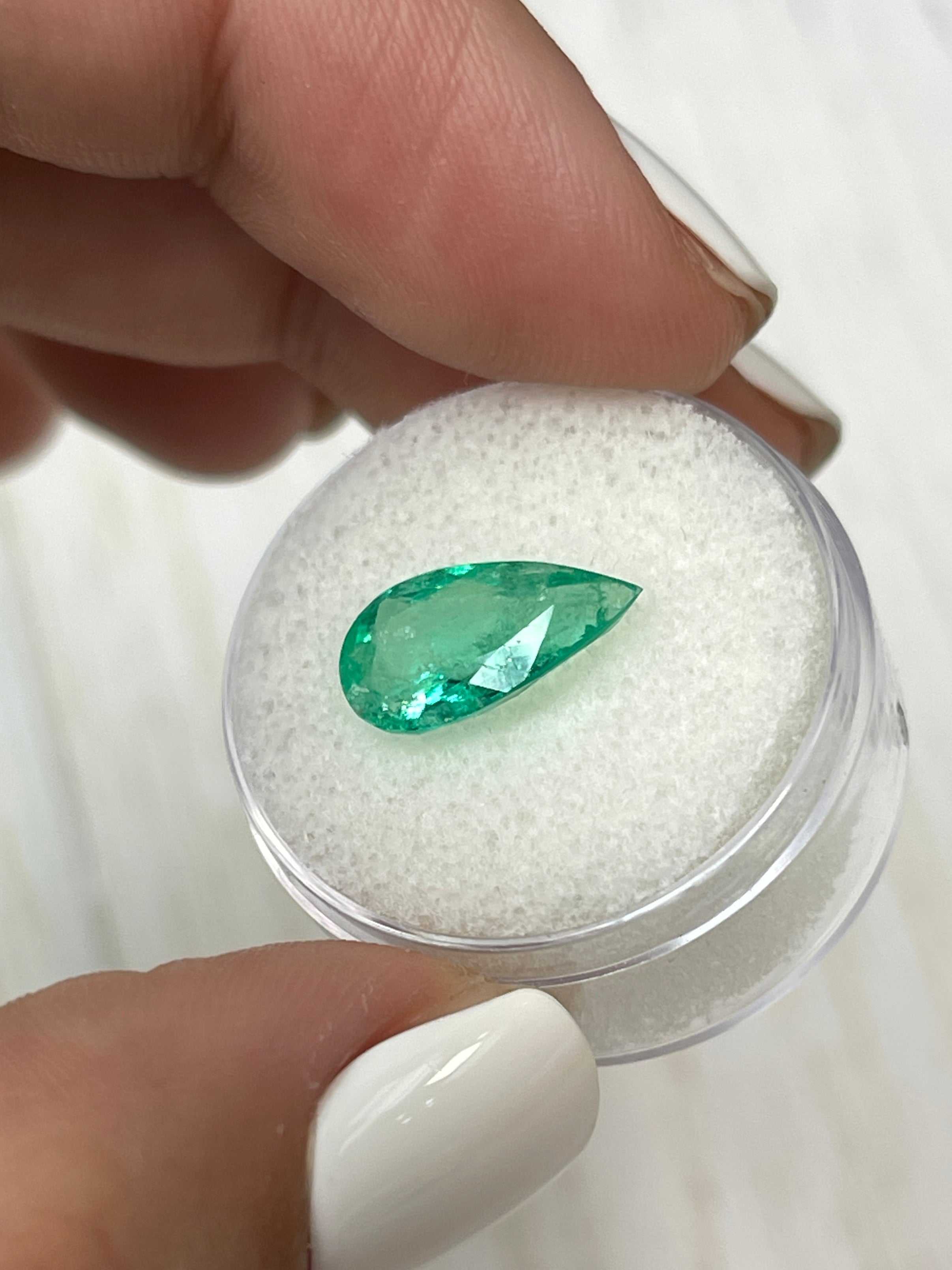 Natural 2.61 carat Colombian emerald loose gemstone in pear cut, green and vibrant, from JR Colombian Emeralds.