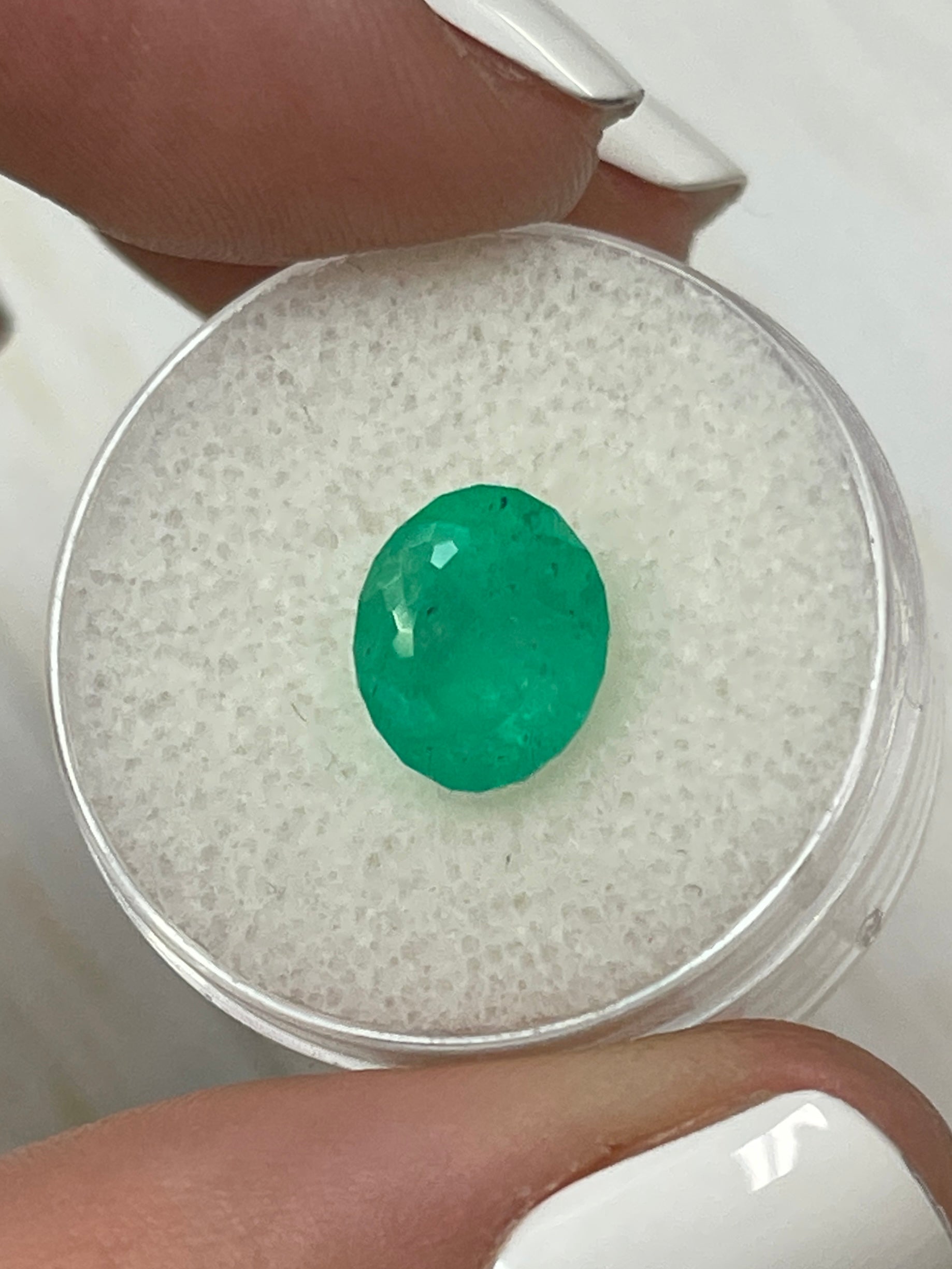 Medium green 2.79 carat natural Colombian emerald loose oval cut gemstone by JR Colombian Emeralds.