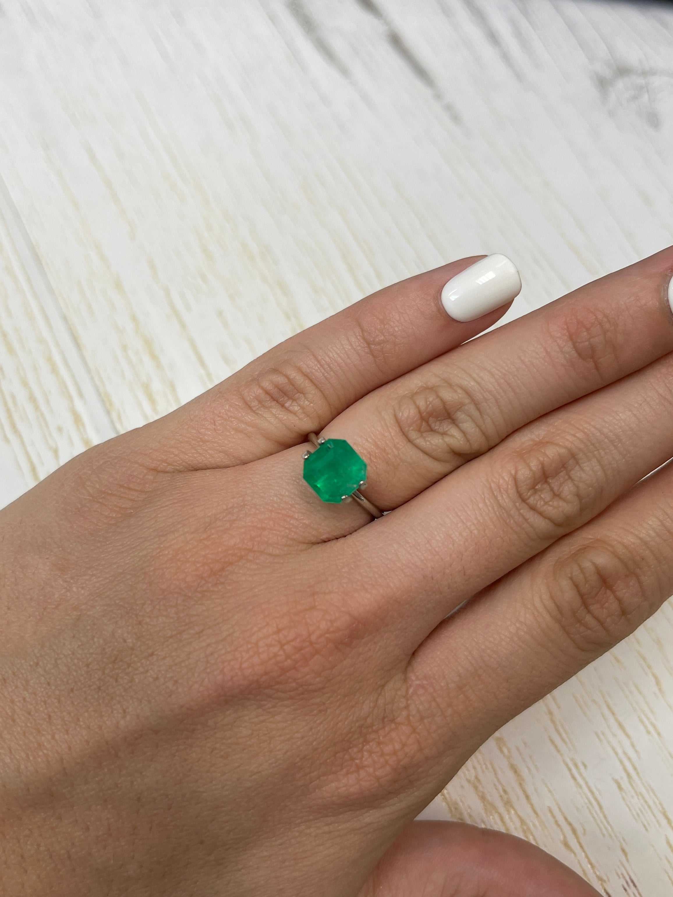 Vibrant 2.82 carat natural Colombian emerald loose stone in Asscher cut, with rich green color and clarity.