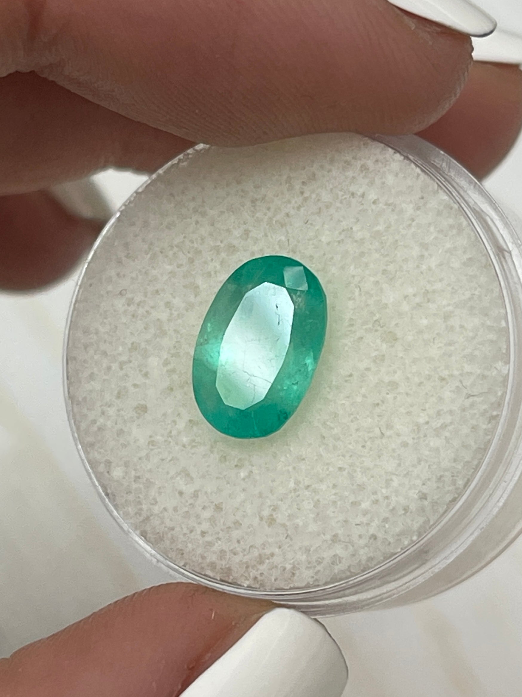 Natural loose Colombian emerald, 2.83 carats, oval cut, pastel mint green, from JR Colombian Emeralds.