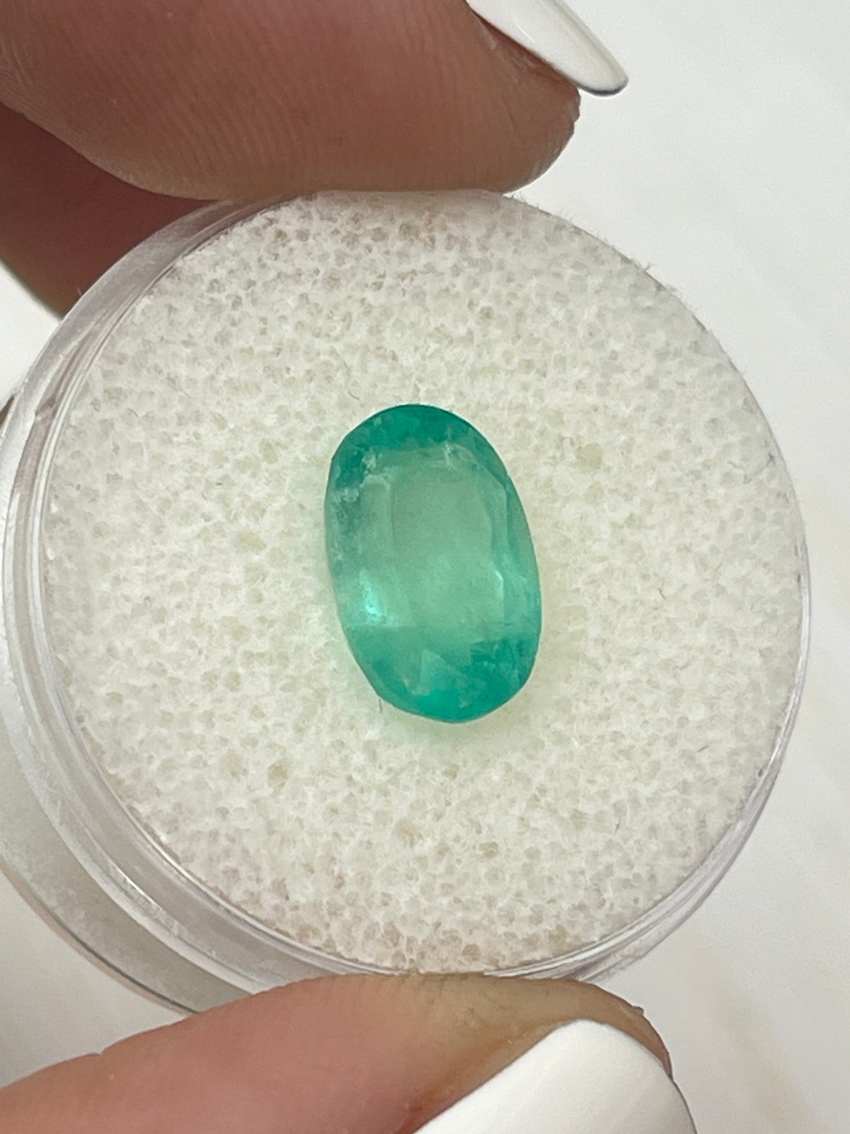 Oval cut 2.83 carat pastel mint green Colombian emerald gemstone from JR Colombian Emeralds. Natural loose emerald.