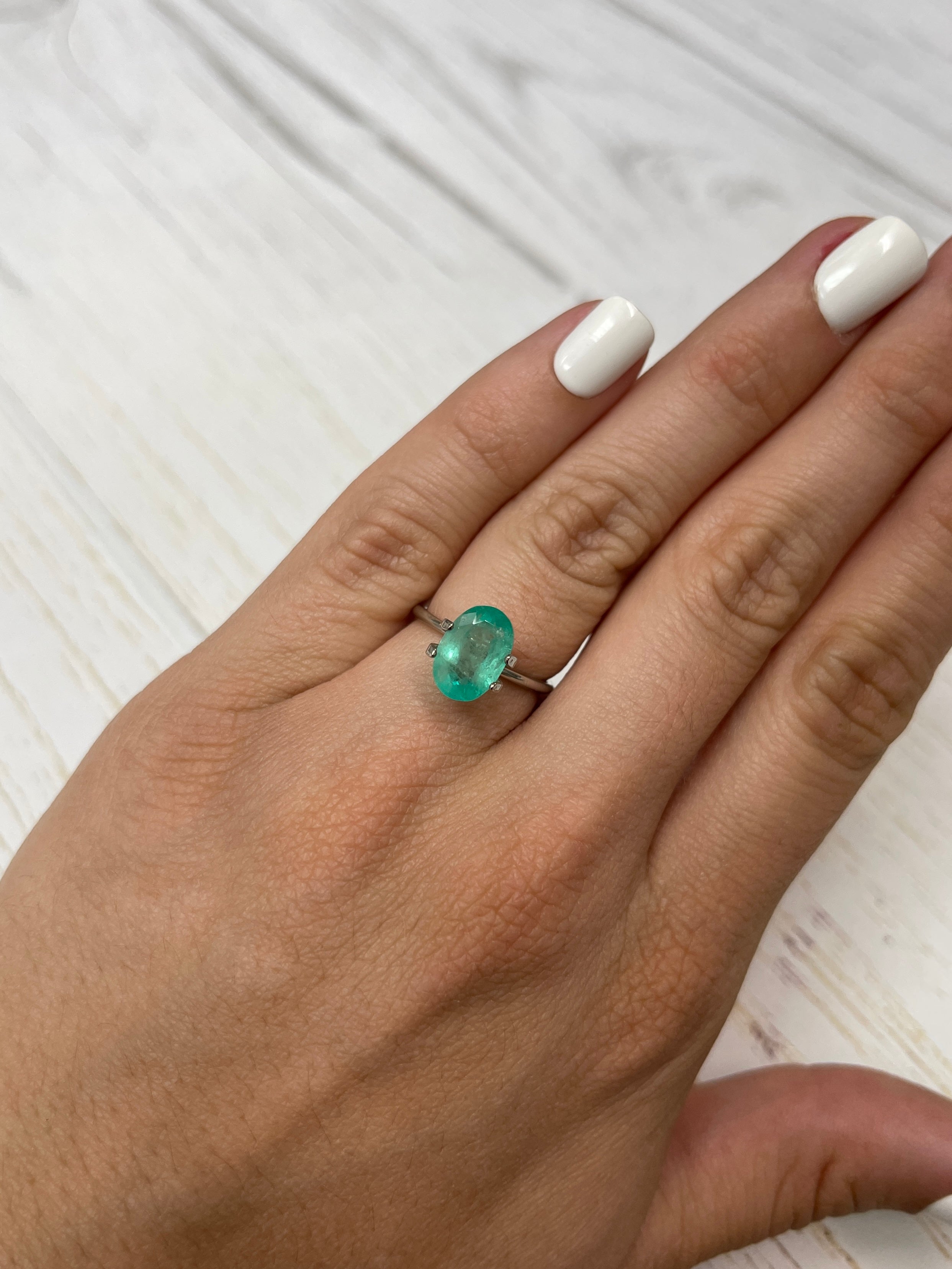 Oval cut 2.83 carat pastel mint green natural Colombian emerald loose gemstone from JR Colombian Emeralds.