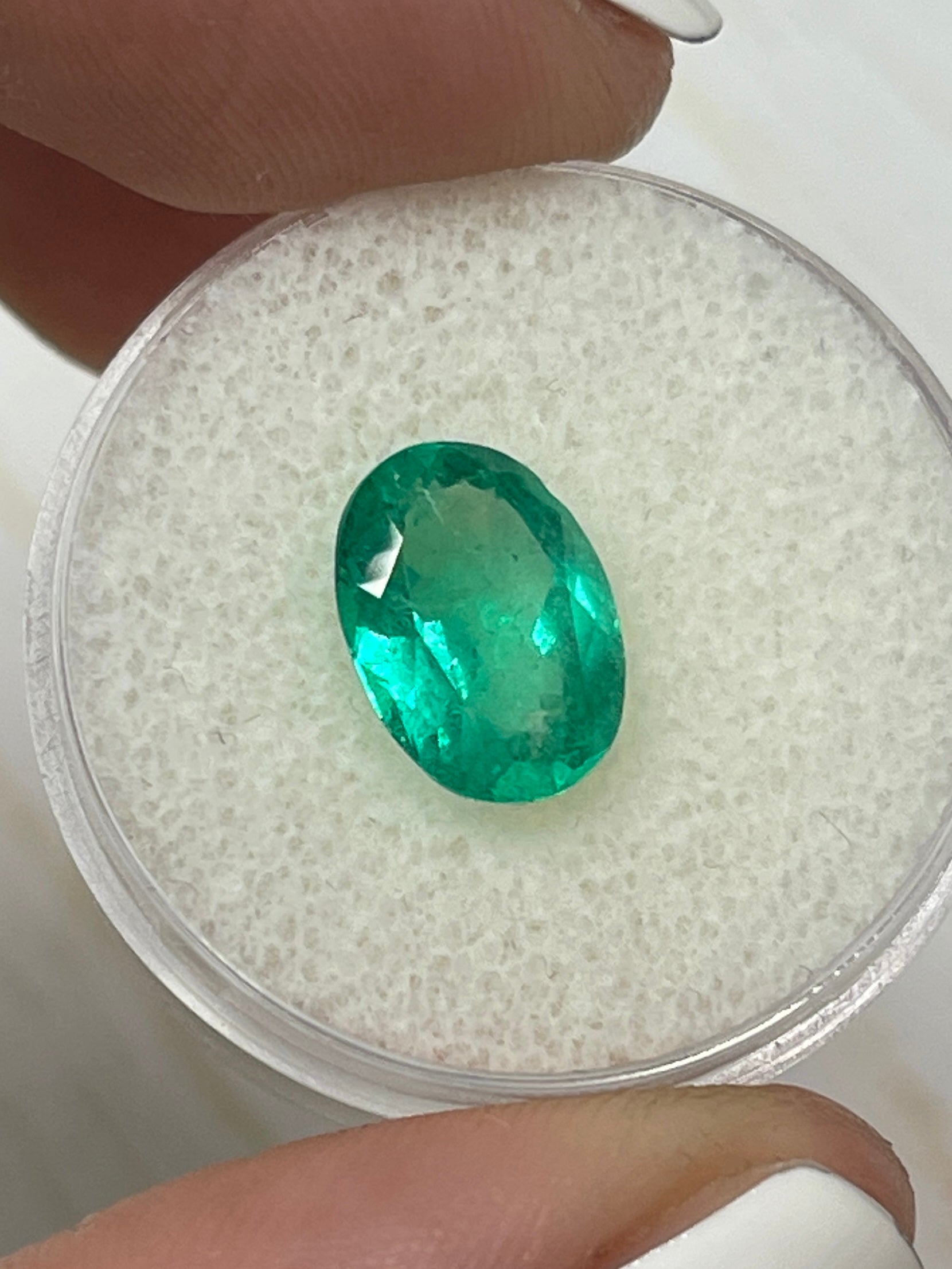 Vibrant green 2.87 carat Colombian emerald loose oval cut gemstone from JR Colombian Emeralds.