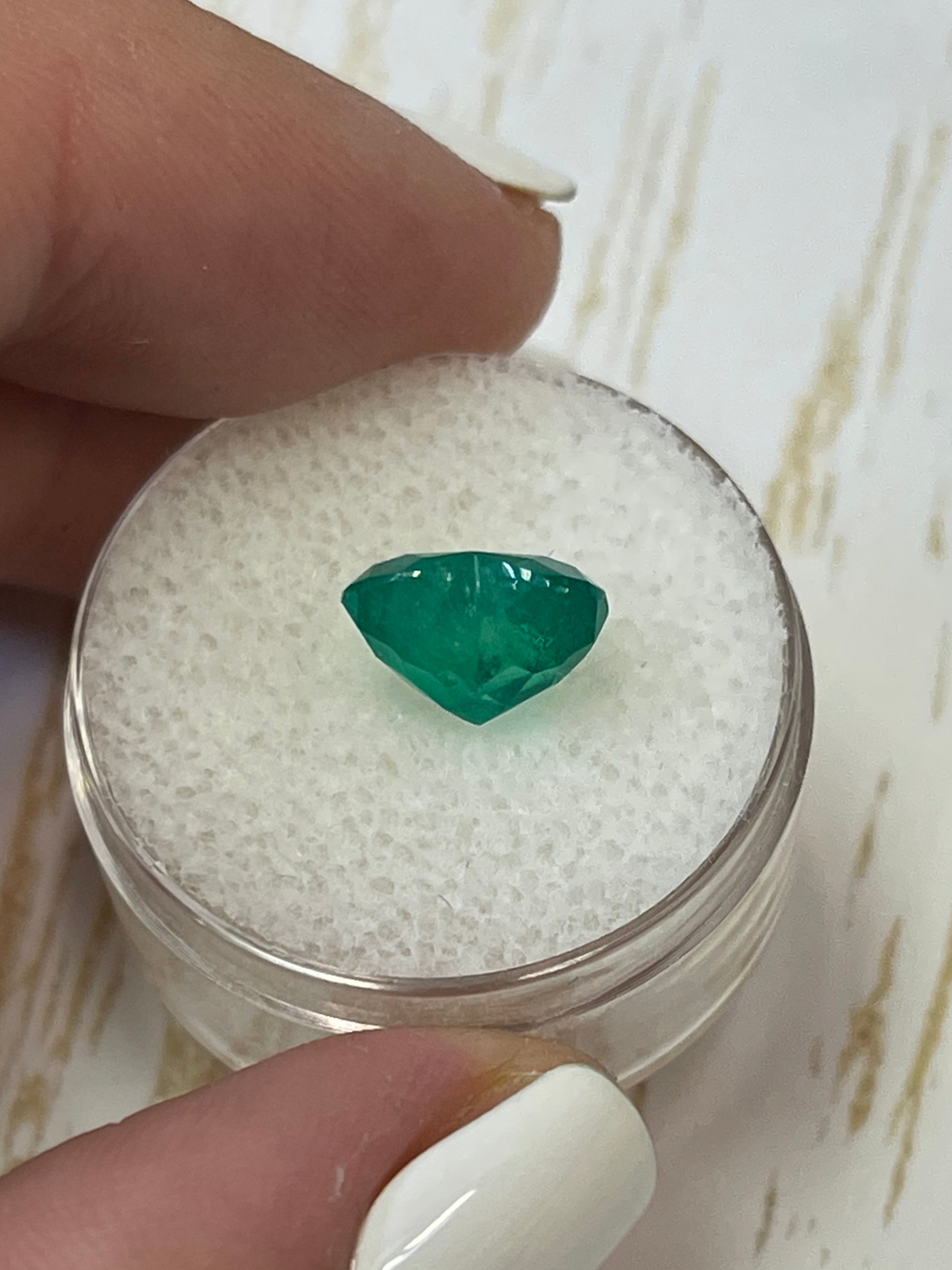 Bright green 2.87 carat Colombian emerald in heart cut, natural loose gemstone from JR Colombian Emeralds.