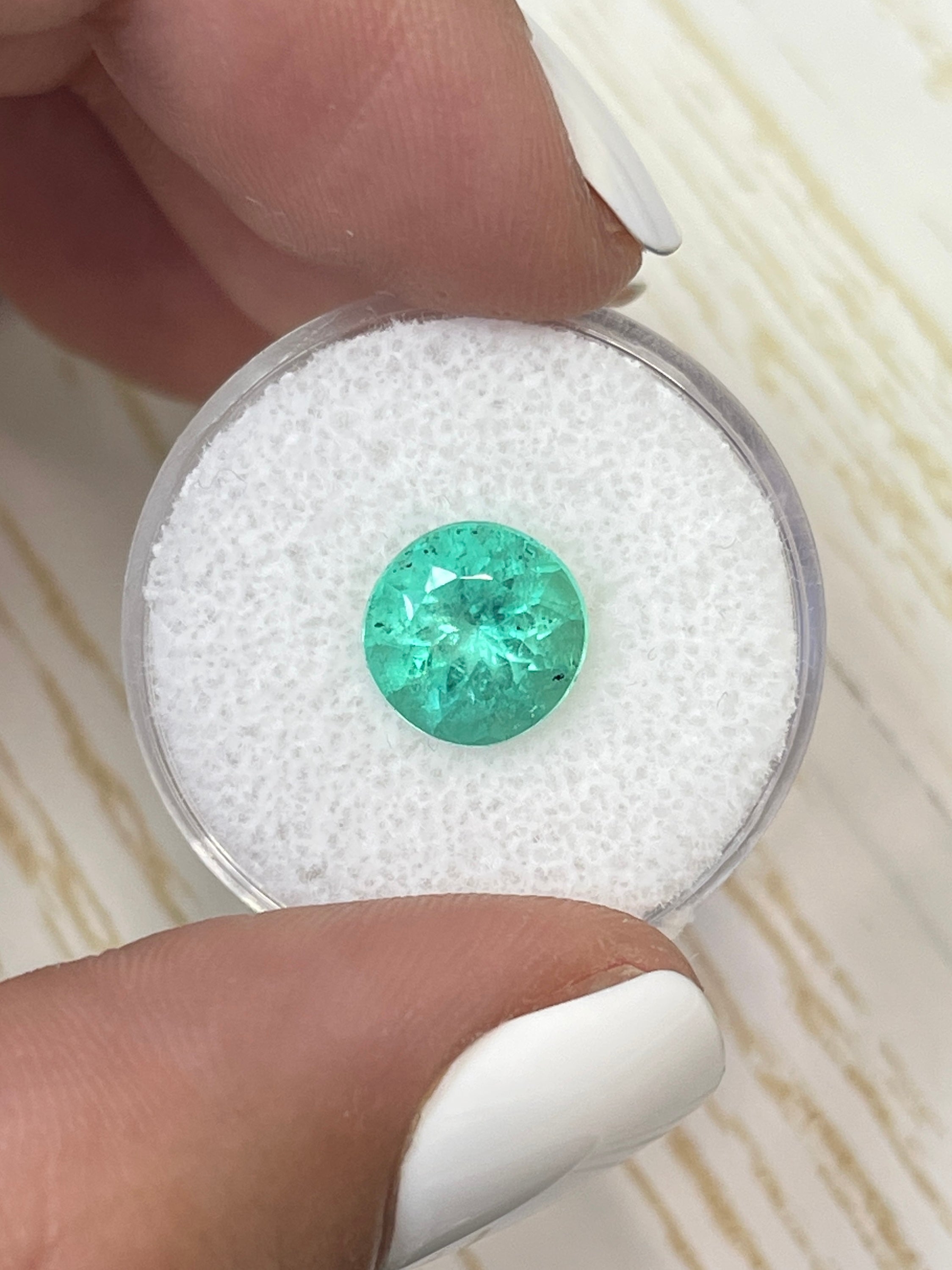 2.87 carat medium green round Colombian emerald loose gemstone from JR Colombian Emeralds, natural and high-quality.