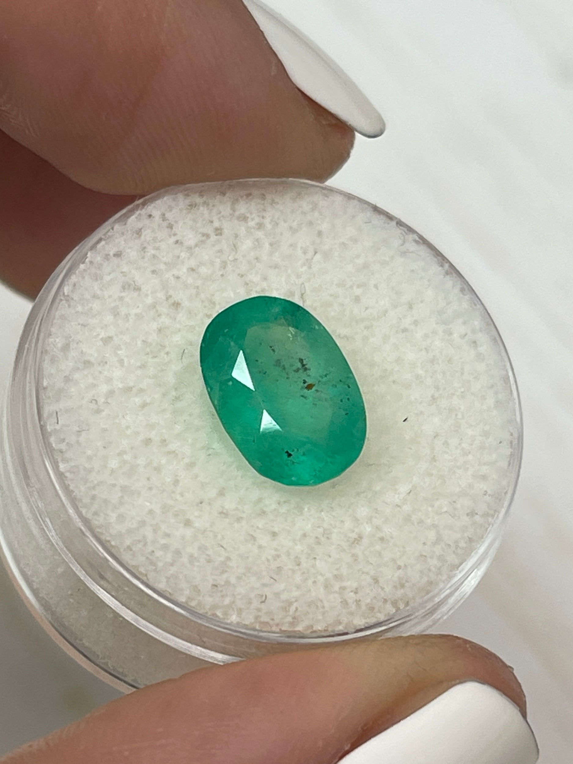 Medium green Colombian emerald loose gemstone, oval cut, 2.95 carats, 11.3x8mm, freckled surface by JR Colombian Emeralds.