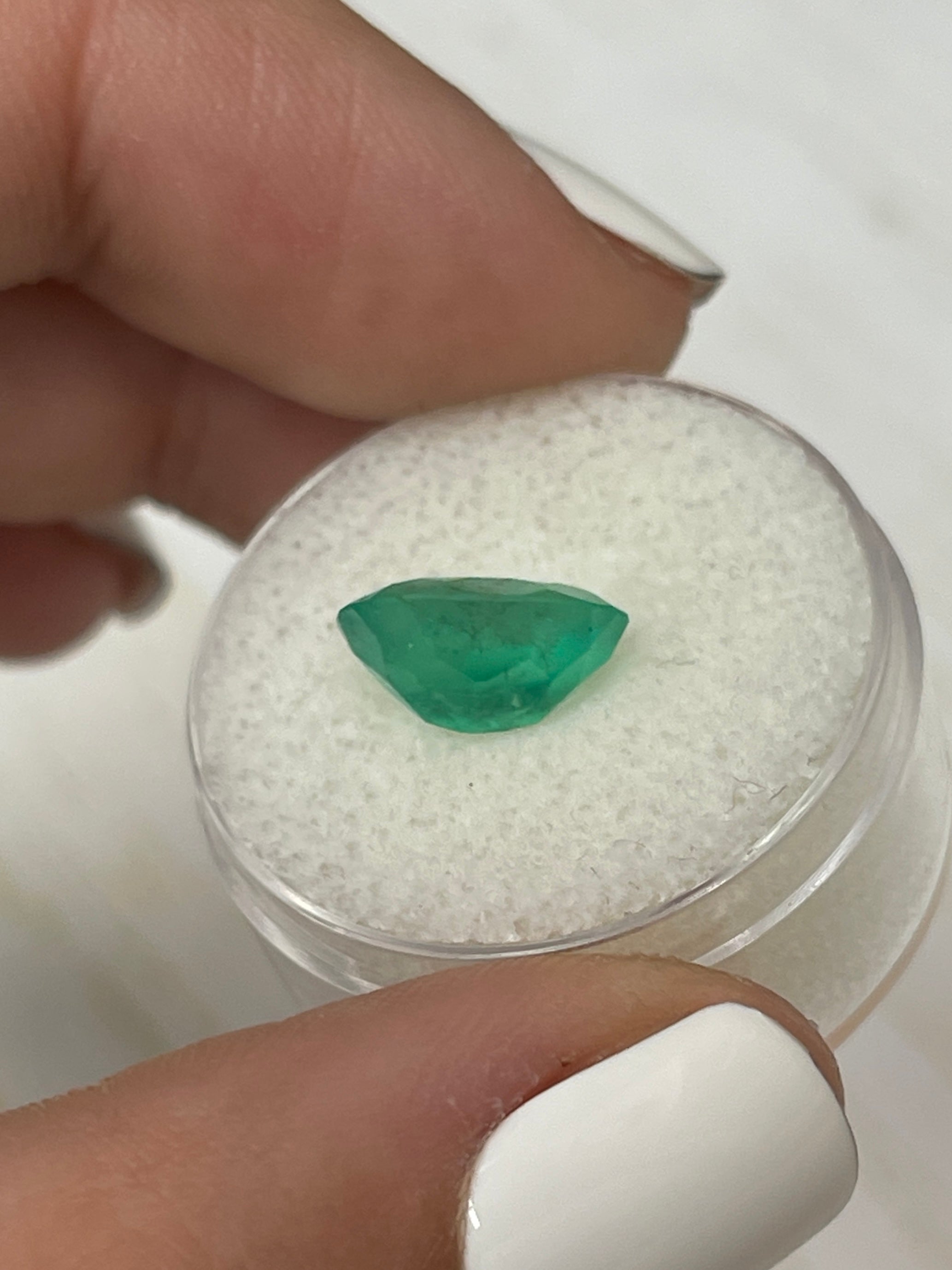 Medium green Colombian emerald oval cut with natural freckles, 2.95 carats, 11.3x8mm loose gemstone from JR Colombian Emeralds.