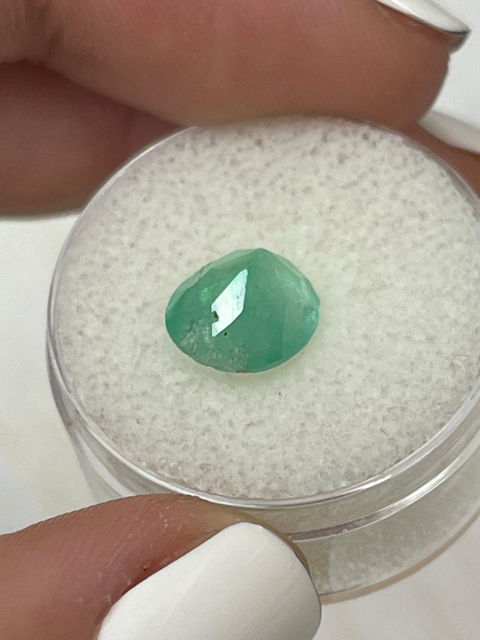2.95 carat pastel mint green natural Colombian emerald in oval cut, loose gemstone from JR Colombian Emeralds.