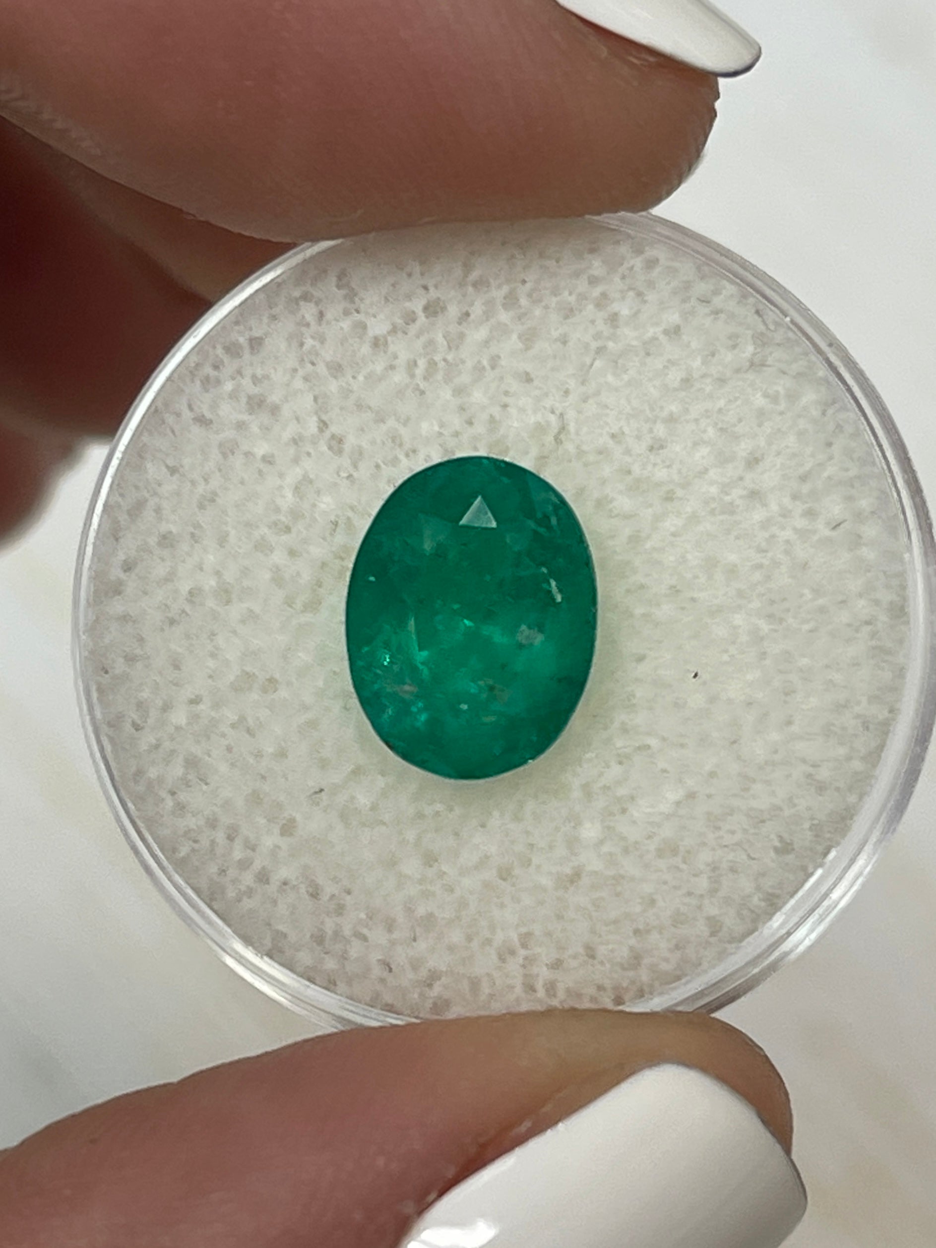 2.98 carat intense dark green Colombian emerald in oval cut, loose gemstone from JR Colombian Emeralds.
