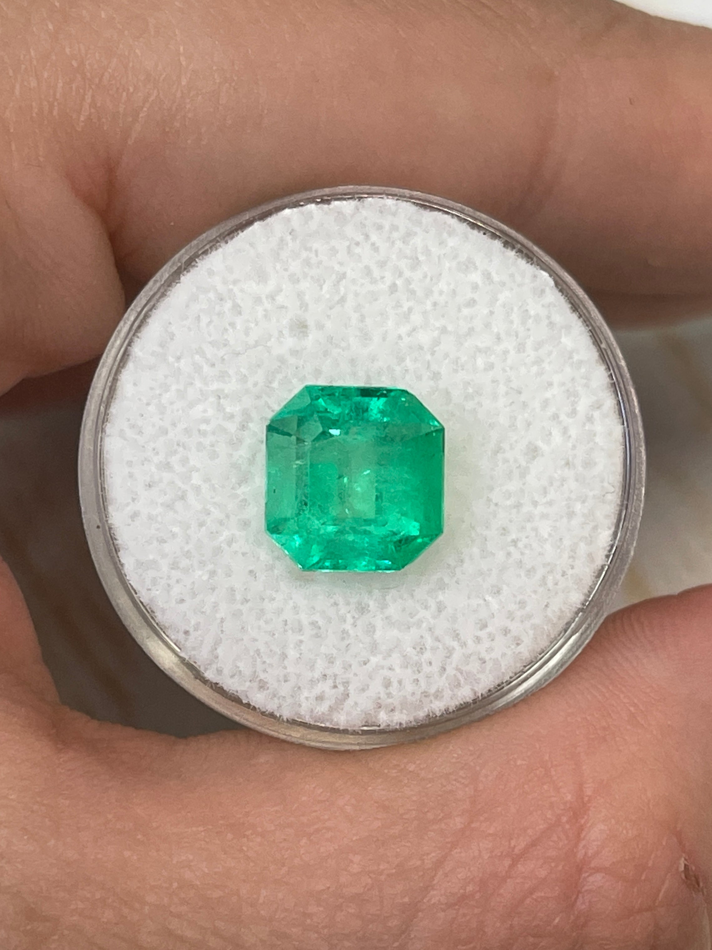 9x9mm yellowish green Colombian emerald loose gemstone, Asscher cut, 3.21 carats, natural and high-quality from JR Colombian Emeralds.