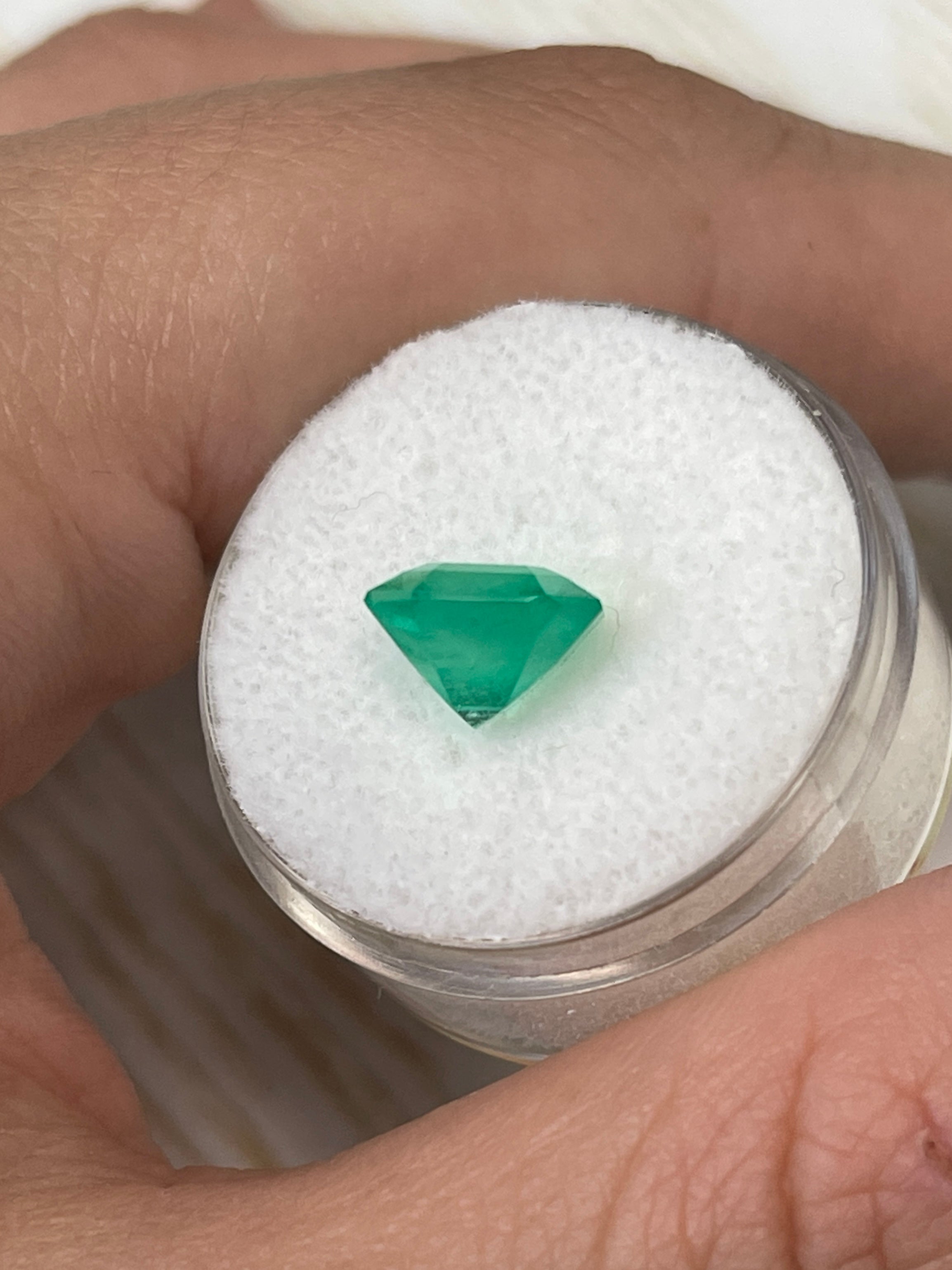 Yellowish green 3.21 carat natural Colombian emerald loose Asscher cut gemstone with radiant clarity.