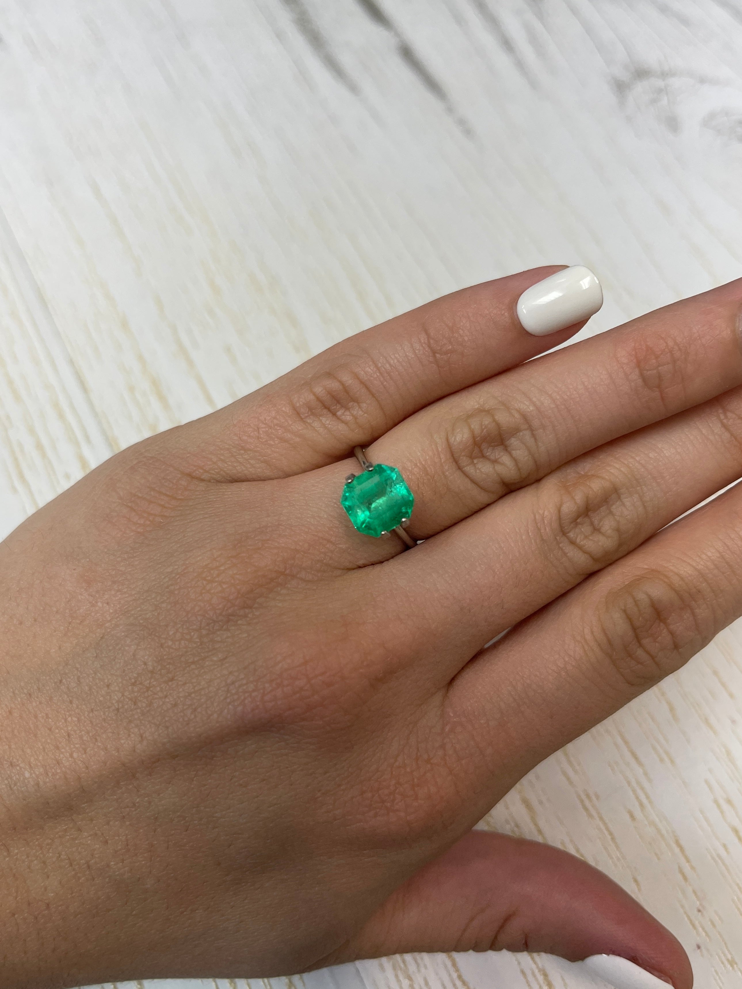 Yellowish green 3.21 carat natural Colombian emerald in Asscher cut, loose gemstone from JR Colombian Emeralds.