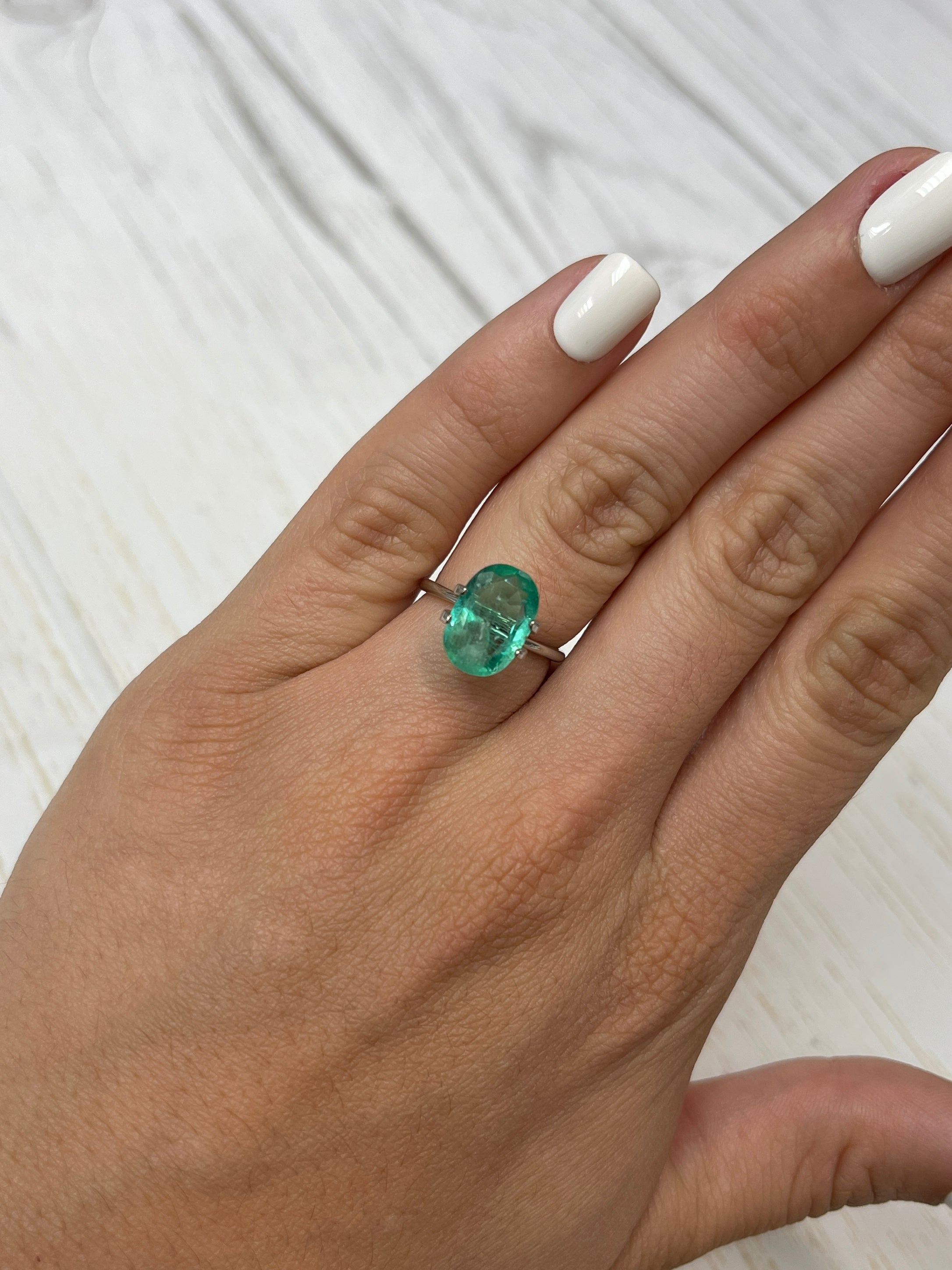 Oval-cut 3.25 carat green Colombian emerald gemstone, natural loose emerald from JR Colombian Emeralds.