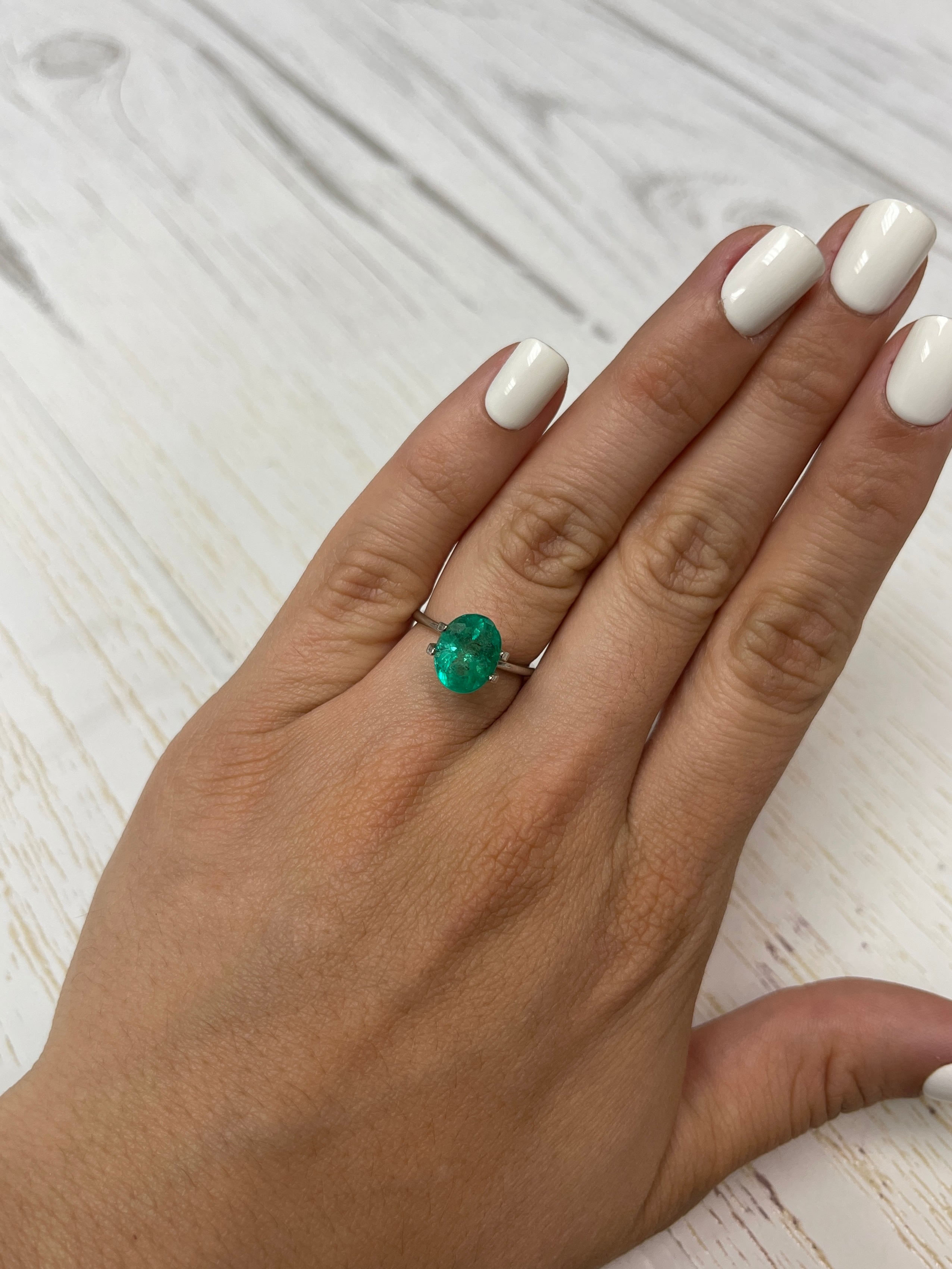 3.32 carat vivid green natural Colombian emerald loose oval cut gemstone from JR Colombian Emeralds.