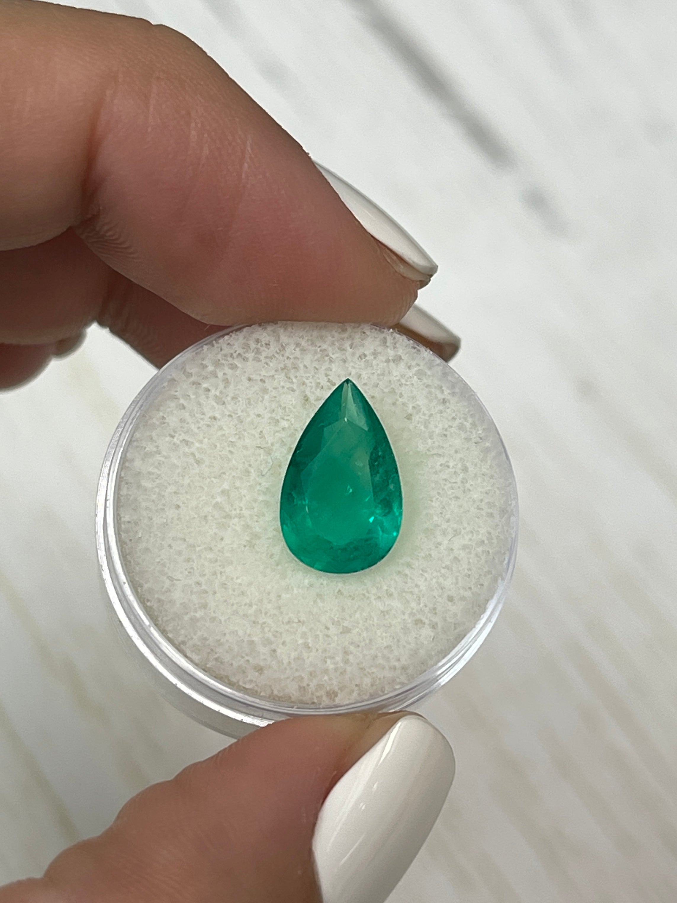 Natural 3.46 carat grass green Colombian emerald loose pear cut gemstone by JR Colombian Emeralds.