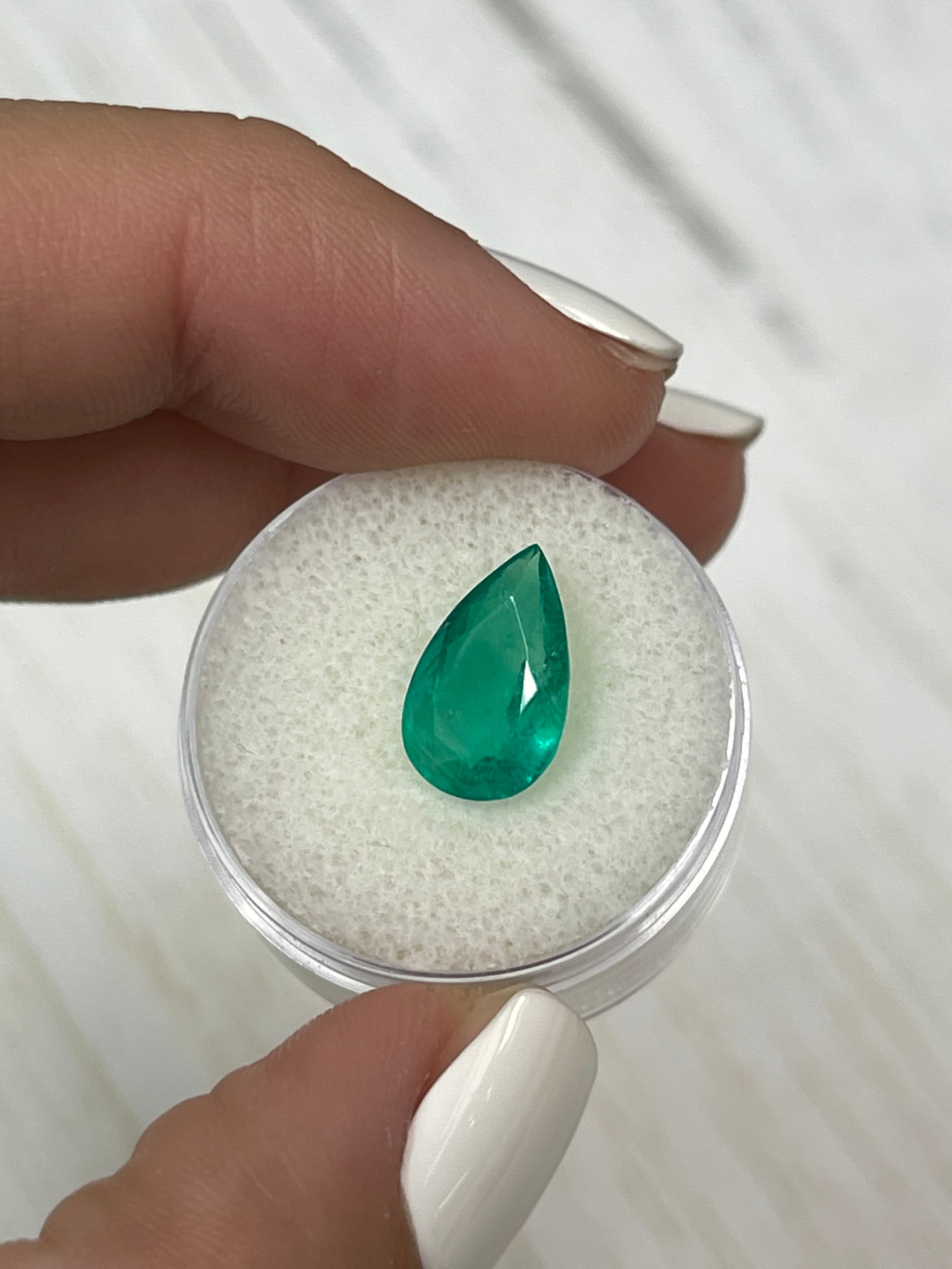 Natural 3.46 carat grass green Colombian emerald in pear cut, loose gemstone from JR Colombian Emeralds.