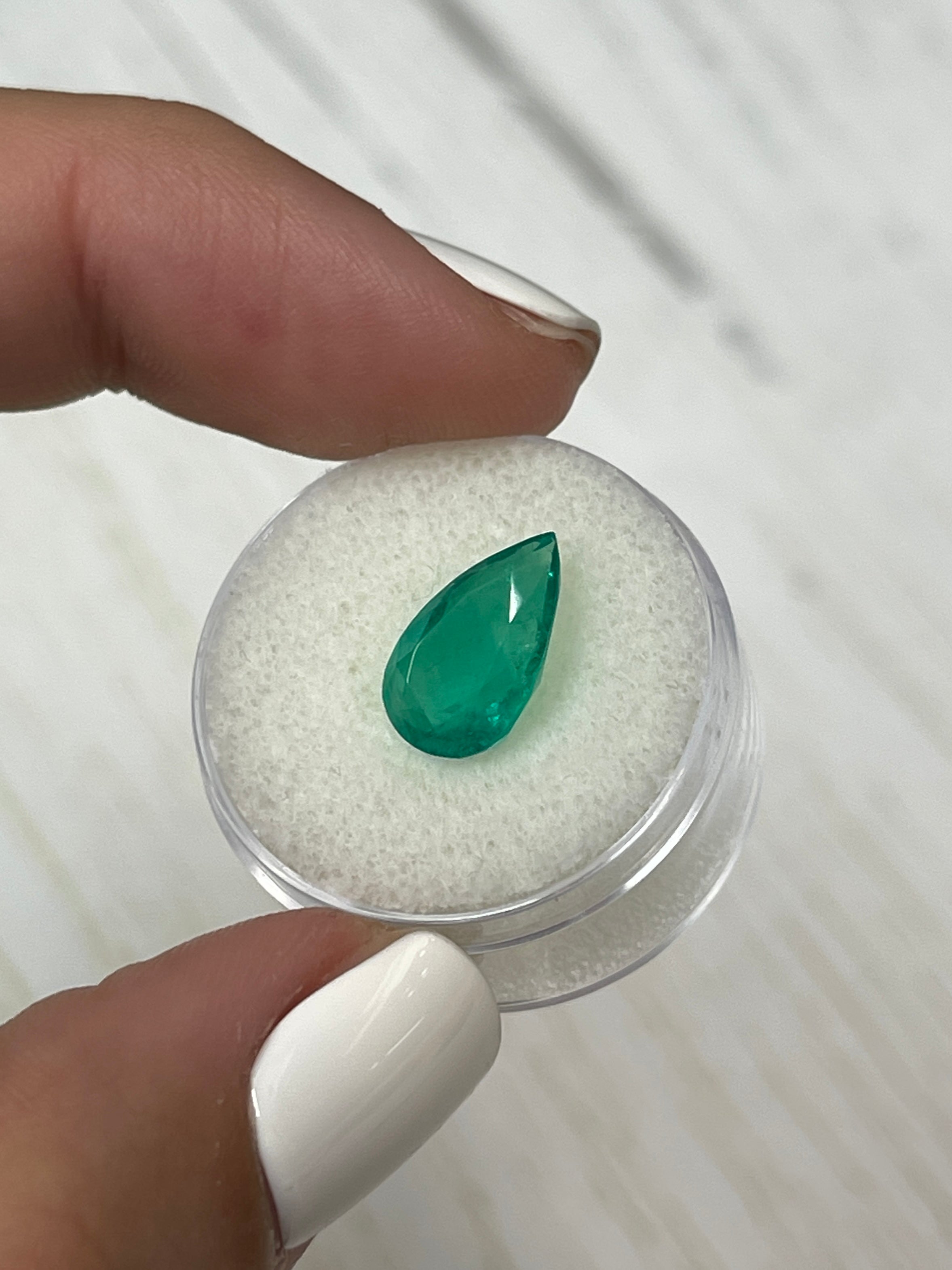 Natural 3.46 carat grass green Colombian emerald loose pear cut gemstone by JR Colombian Emeralds.