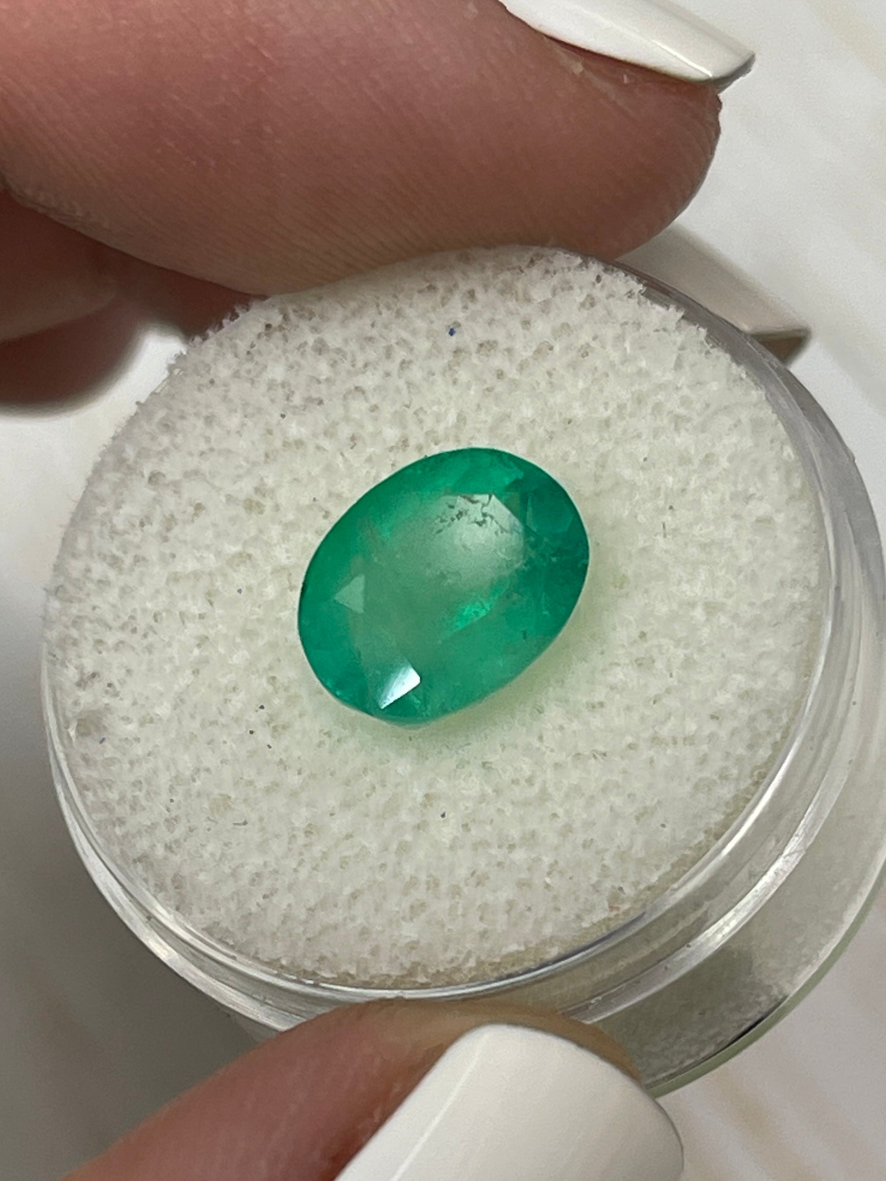 3.48 carat semi-transparent green Colombian emerald loose oval cut gemstone from JR Colombian Emeralds.