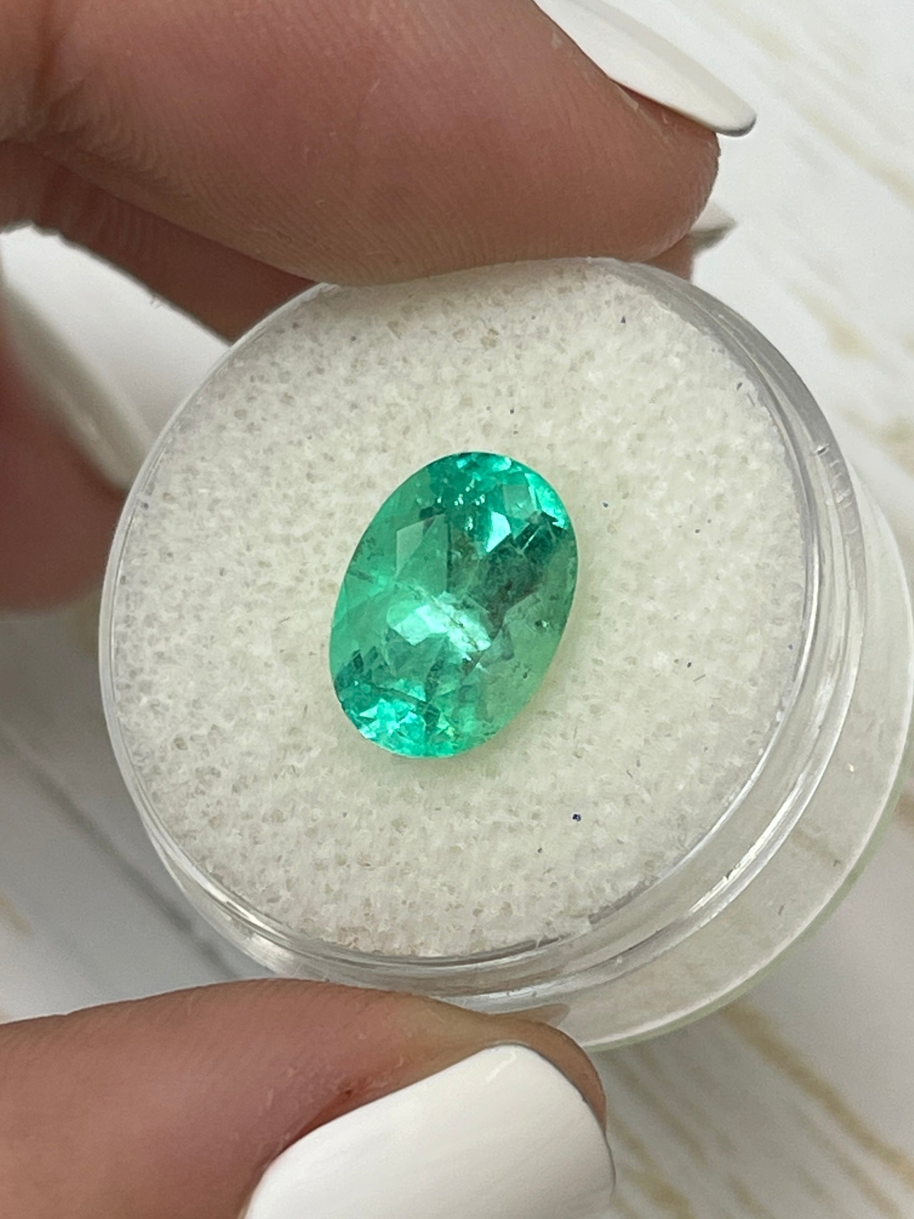 3.55 carat light bluish-green Colombian emerald loose oval cut gemstone from JR Colombian Emeralds.