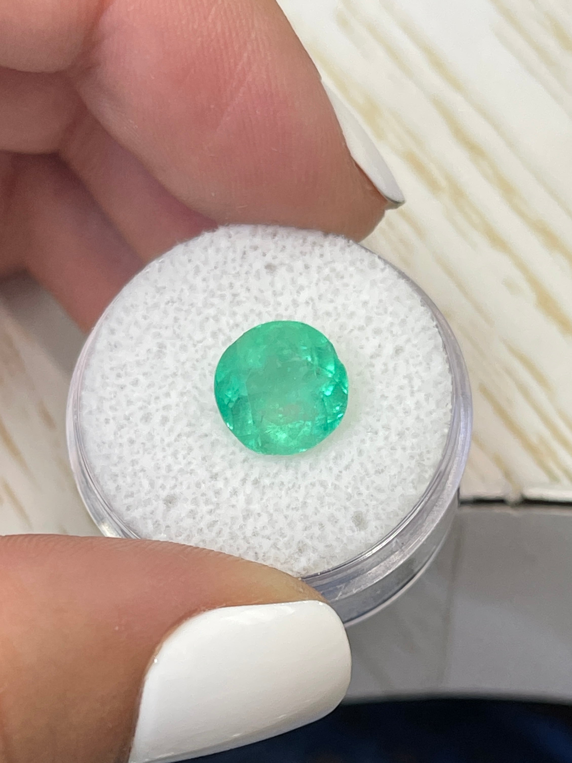 3.65 carat round green Colombian emerald loose gemstone with vibrant natural color and clarity, from JR Colombian Emeralds.