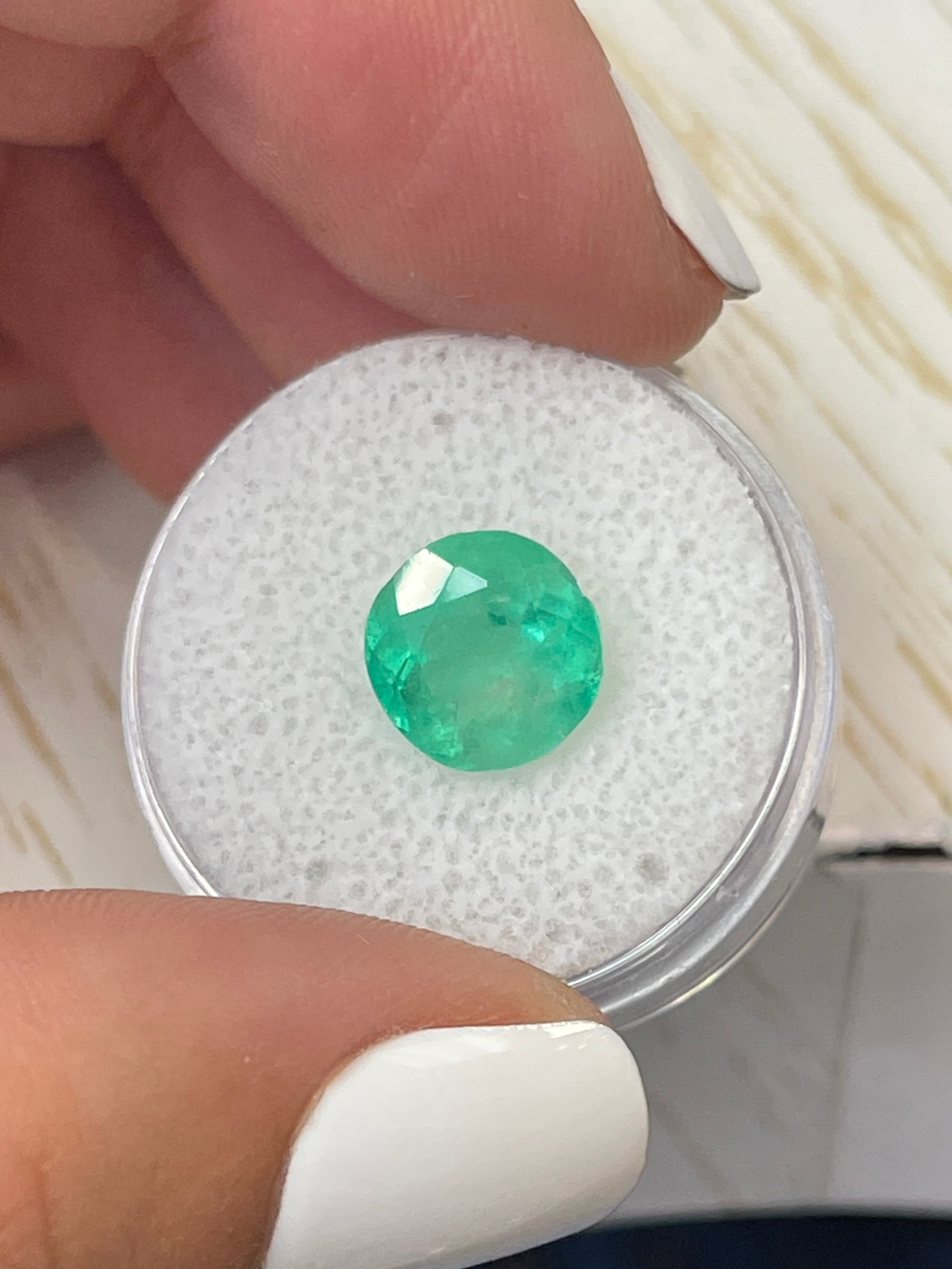 Natural round Colombian emerald loose gemstone, 3.65 carats, vibrant green color, 9.7x9.7mm size, from JR Colombian Emeralds.