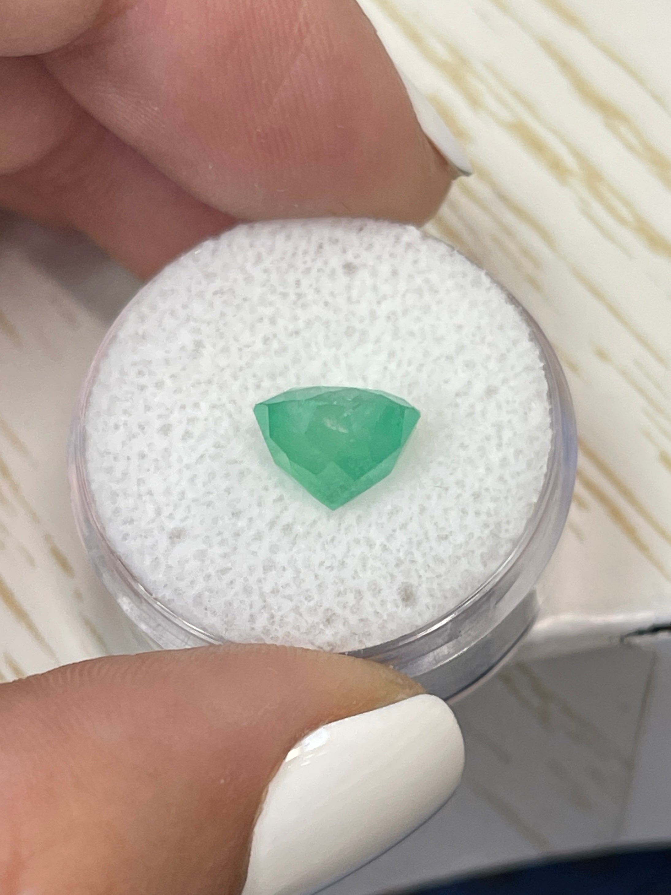 Round 3.65 carat natural Colombian emerald with vibrant green color and 9.7x9.7mm size, loose gemstone from JR Colombian Emeralds.