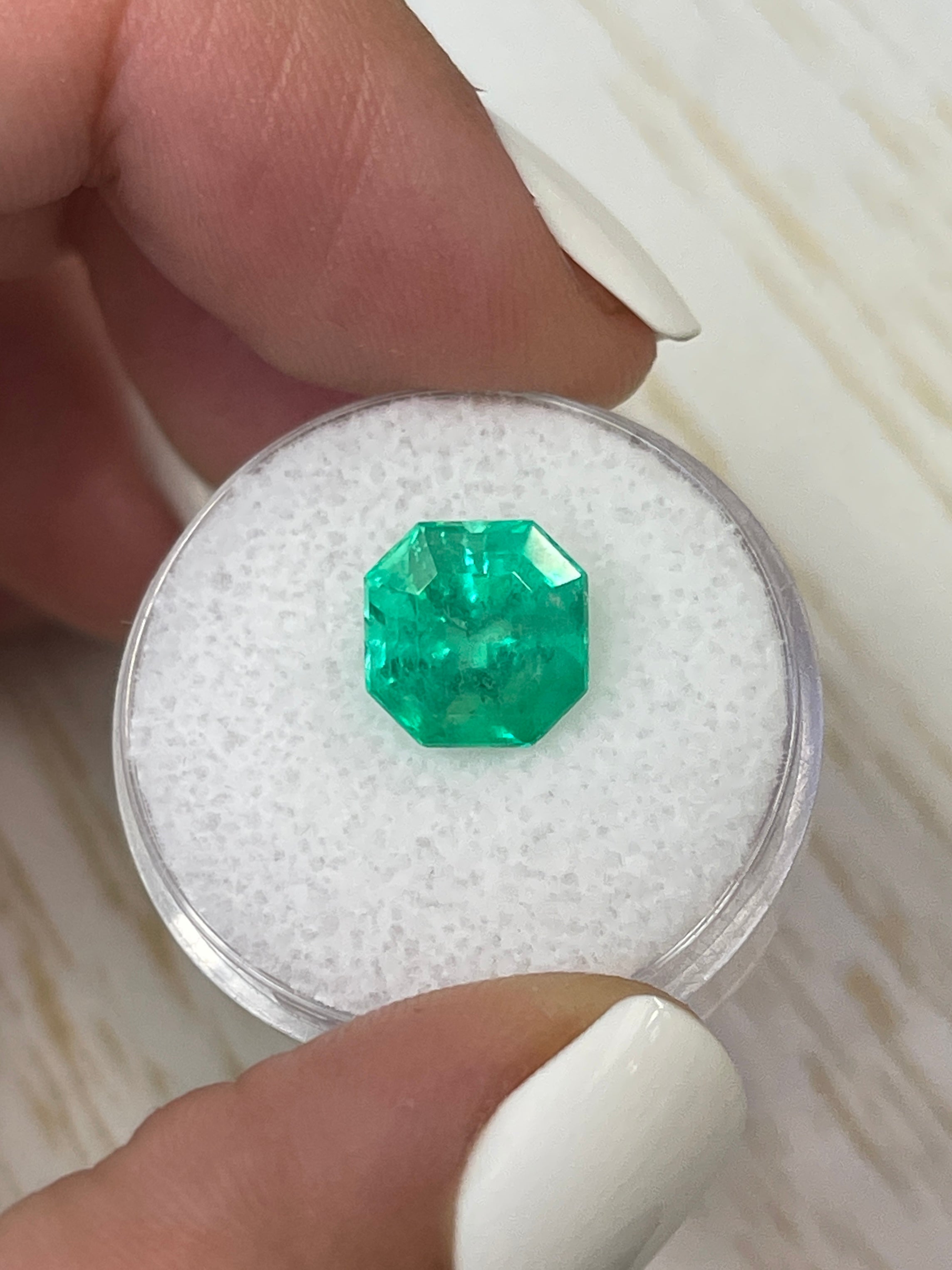 Luminous 3.68 Carat natural Colombian emerald loose gemstone with Asscher cut and clipped corners, from JR Colombian Emeralds.