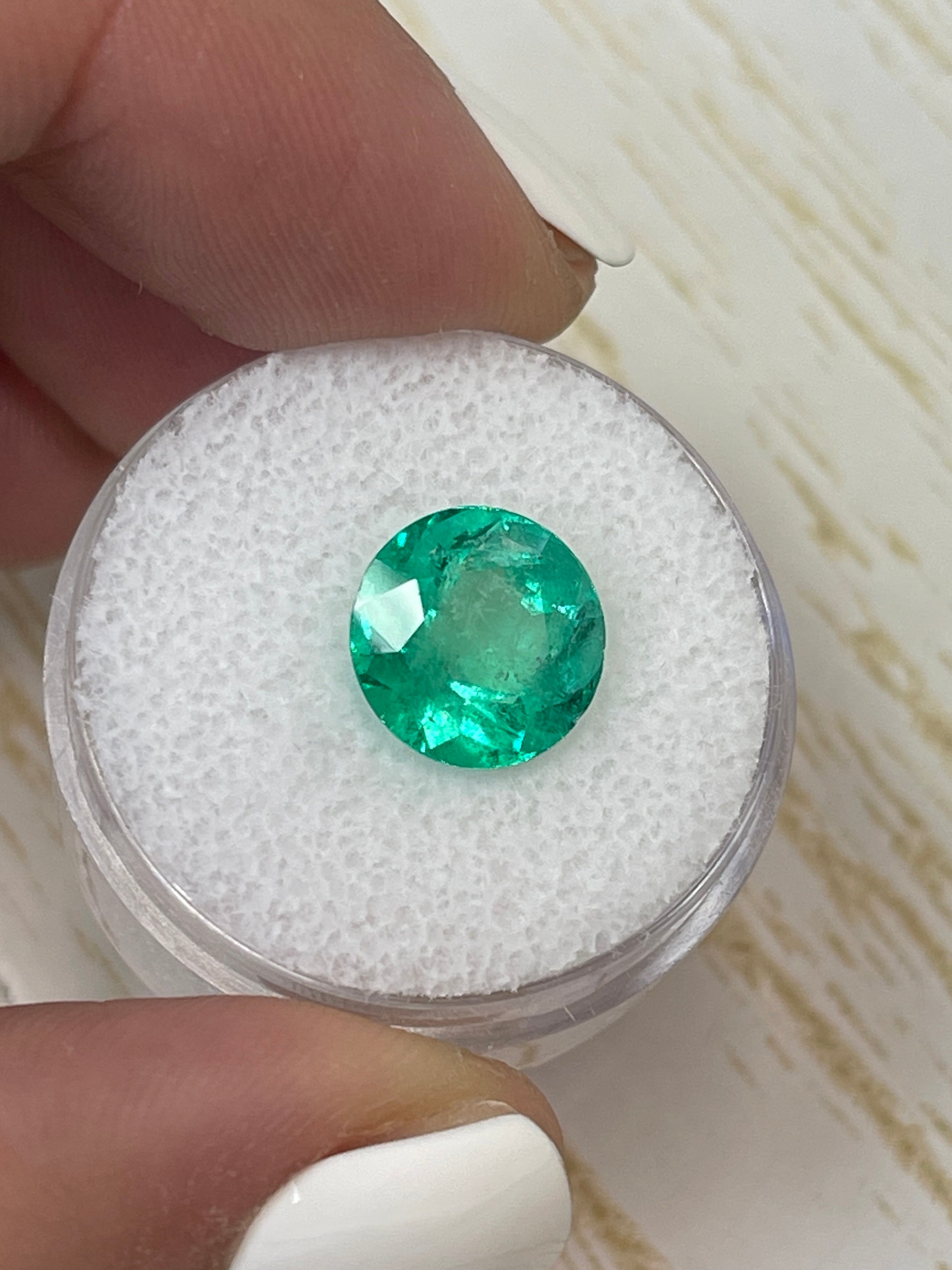Vibrant green 3.79 carat round natural Colombian emerald gemstone, loose and polished, from JR Colombian Emeralds.
