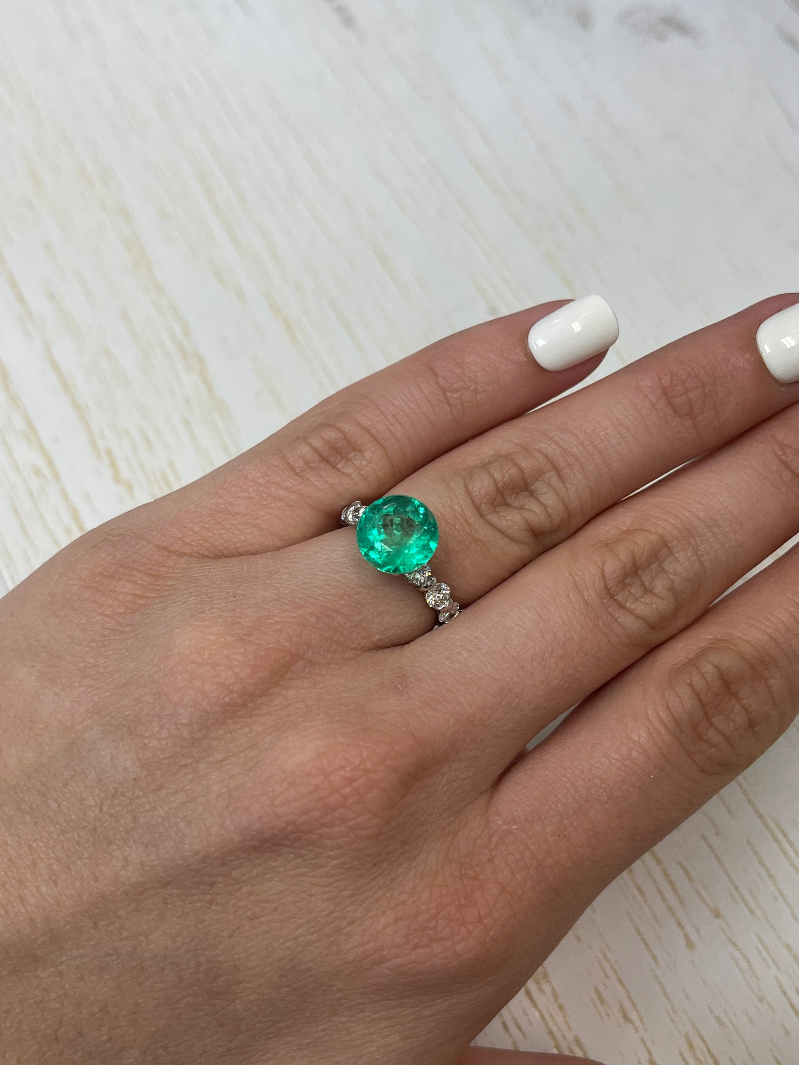 Vibrant green 3.79 carat round Colombian emerald loose gemstone from JR Colombian Emeralds, natural and high-quality.