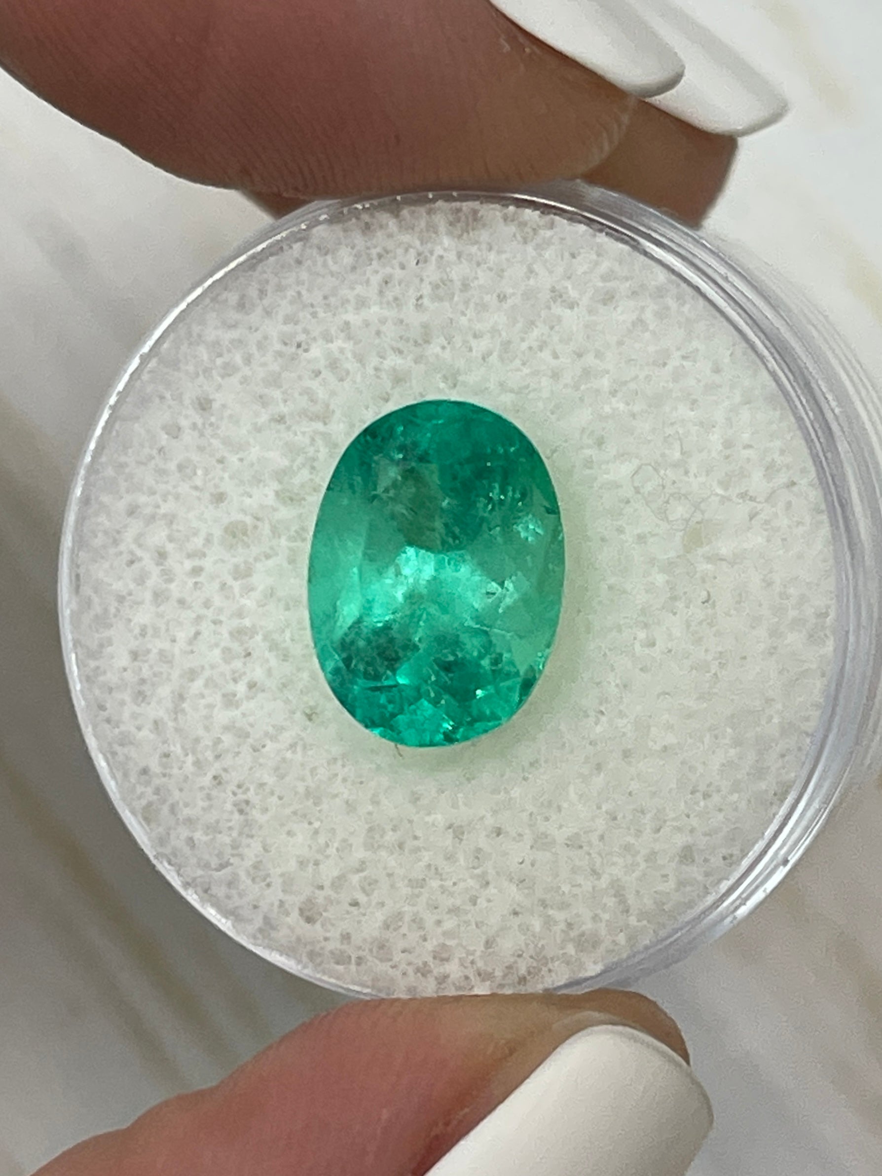 Vibrant 3.86 carat spring green Colombian emerald loose oval cut gemstone from JR Colombian Emeralds.
