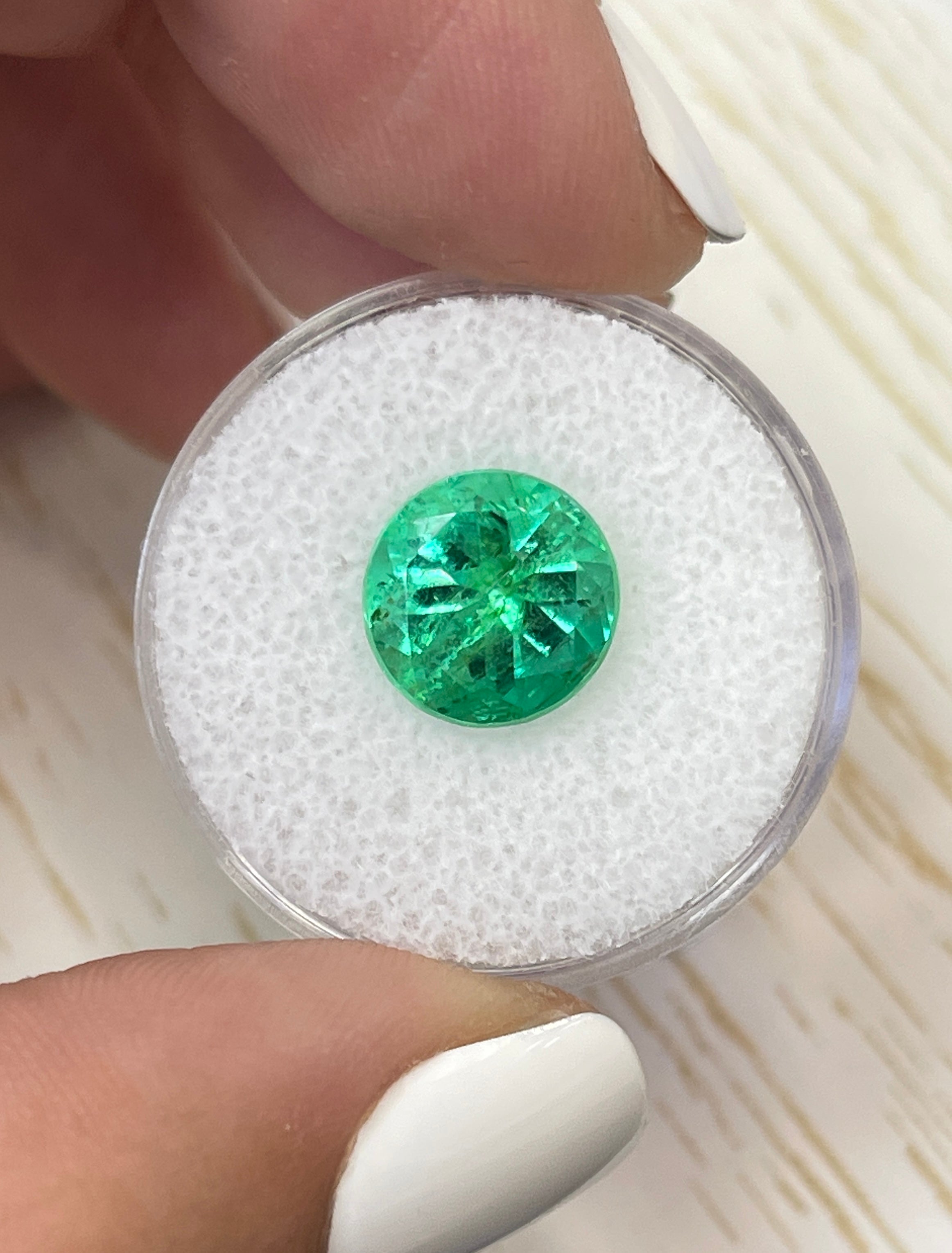 4.14 carat natural round Colombian emerald loose gemstone with rich green color and certification, from JR Colombian Emeralds.