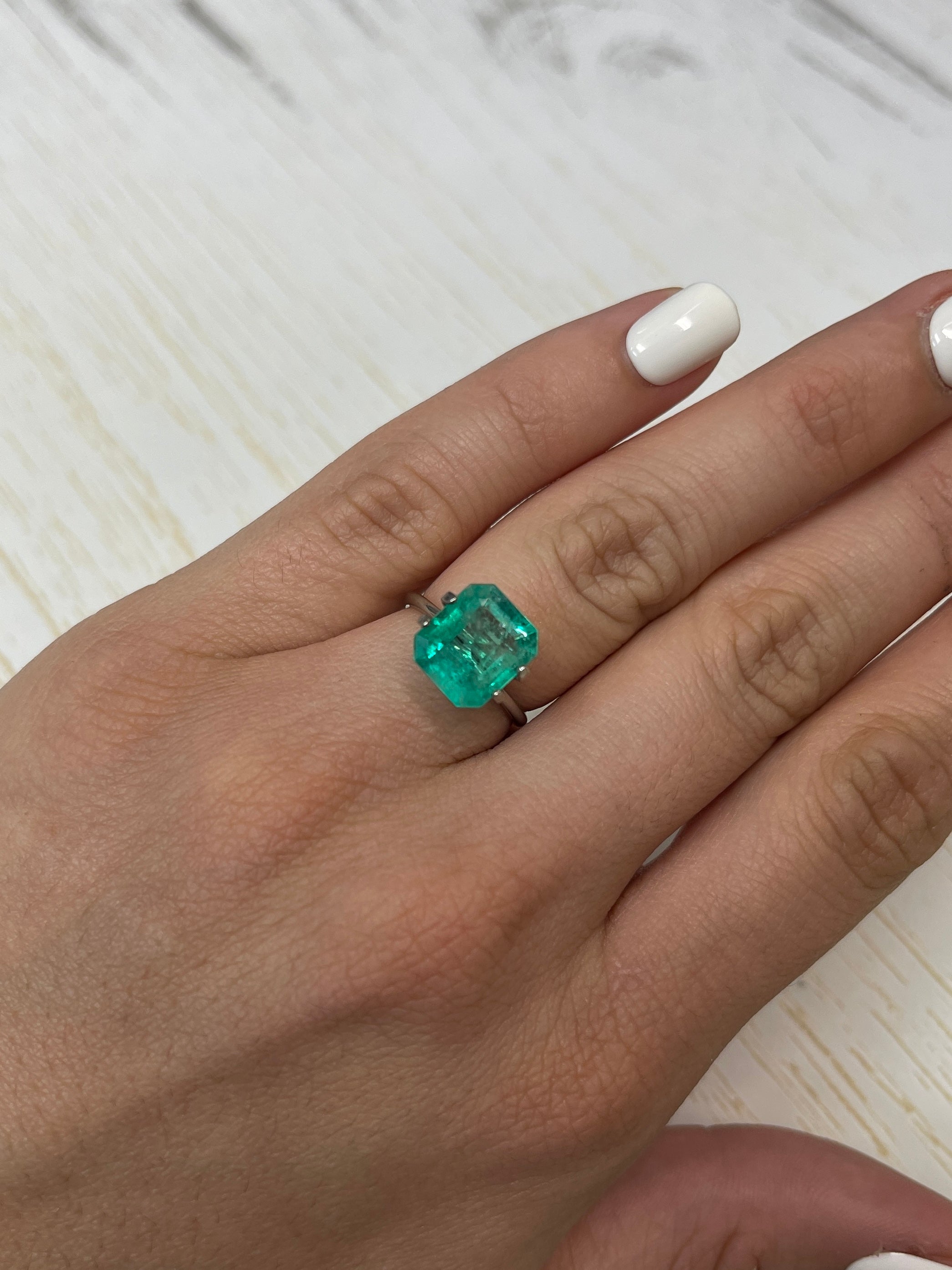 Bluish green 4.17 carat Colombian emerald, natural loose gemstone in classic emerald cut, from JR Colombian Emeralds.