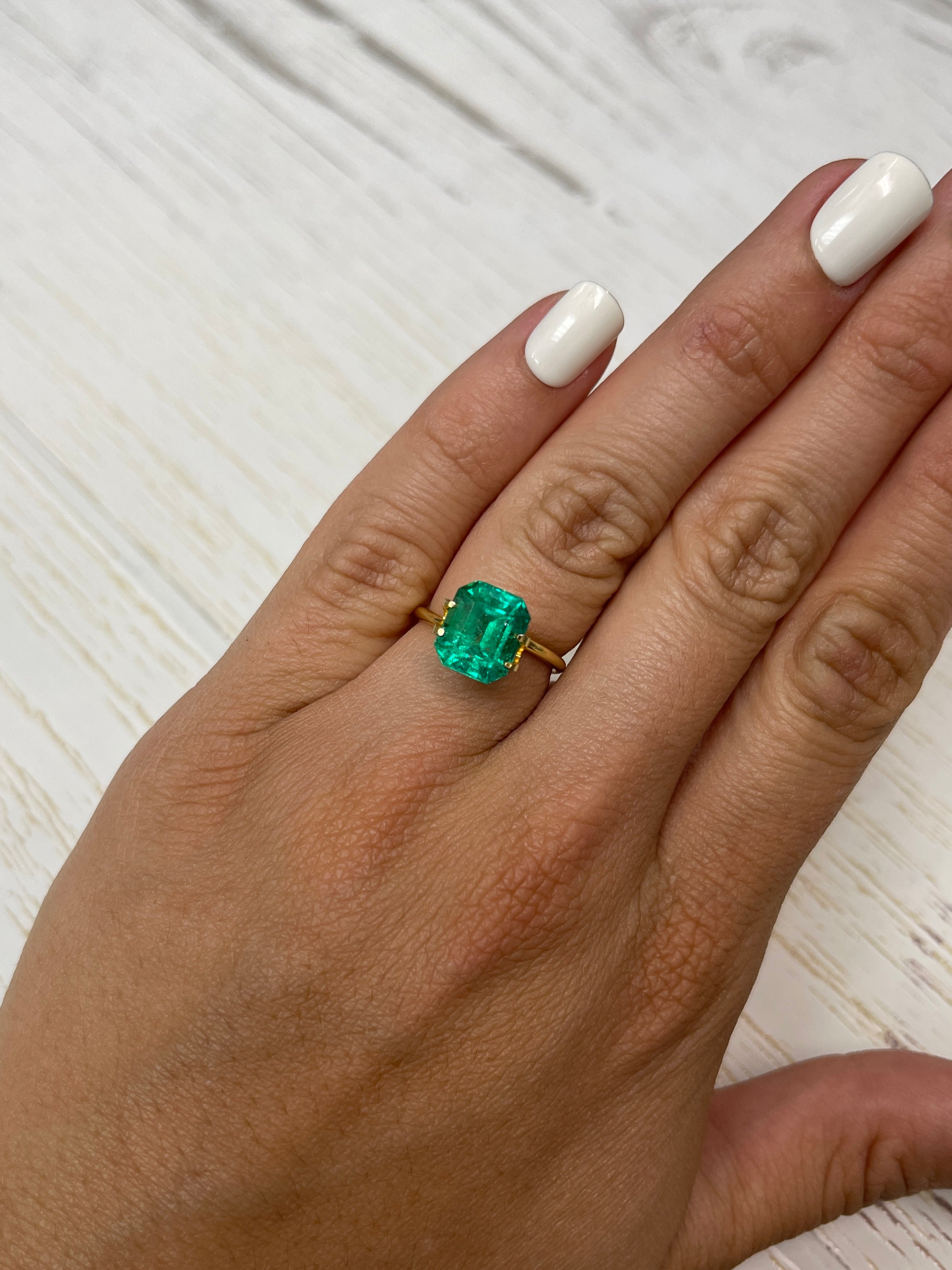 Vivid green 4.26-carat Colombian emerald loose gemstone in an emerald cut, from JR Colombian Emeralds.