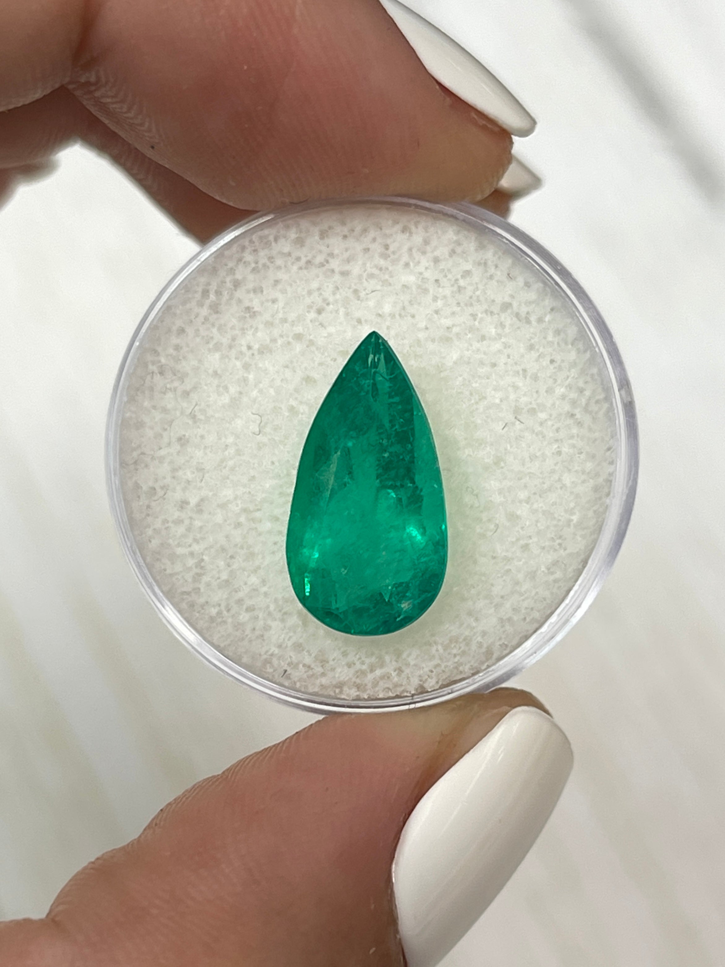 Rich green 4.34 carat natural Colombian emerald in a pear cut, showcasing vibrant color and clarity from JR Colombian Emeralds.